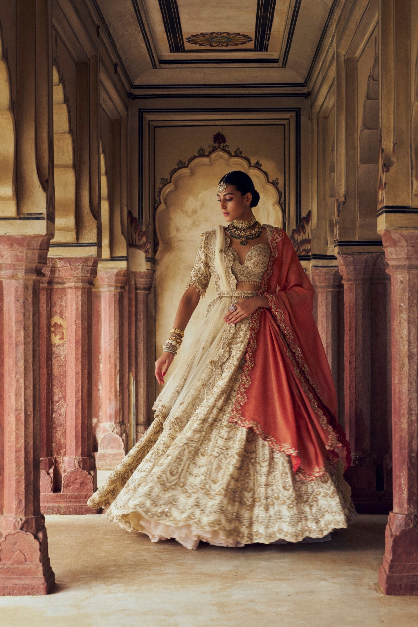Gold Raw Silk Lehenga Choli with 3-D Embroidered Net Dupatta