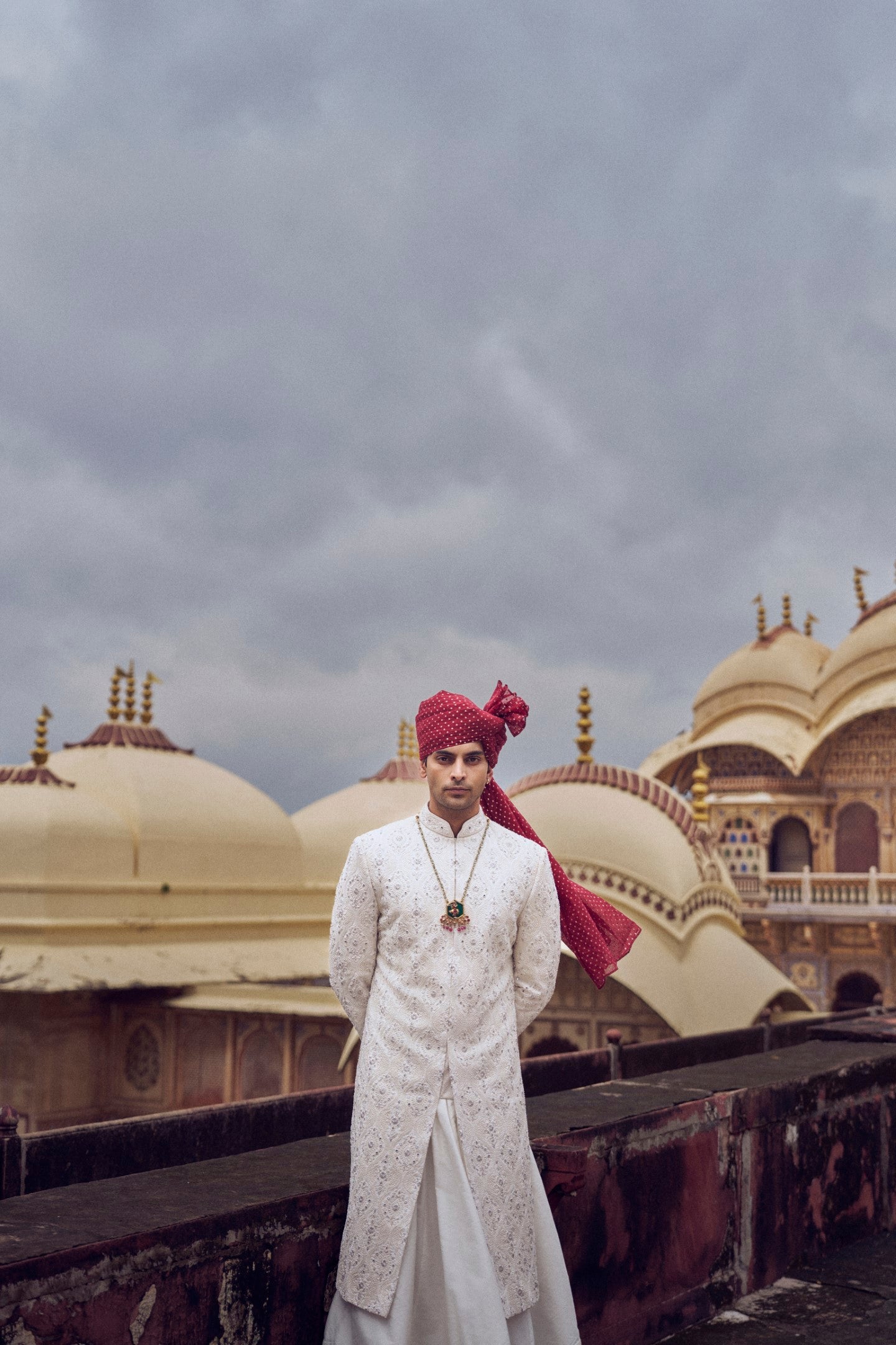 IVORY RAW SILK SHERWANI WITH A COTTON SILK CHOGA AND CHURIDAR