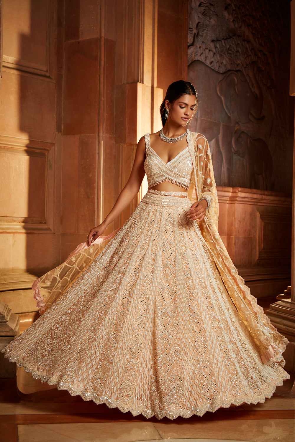 Nude Pink Tulle Lehenga Choli Set with Intricate Worked Belt