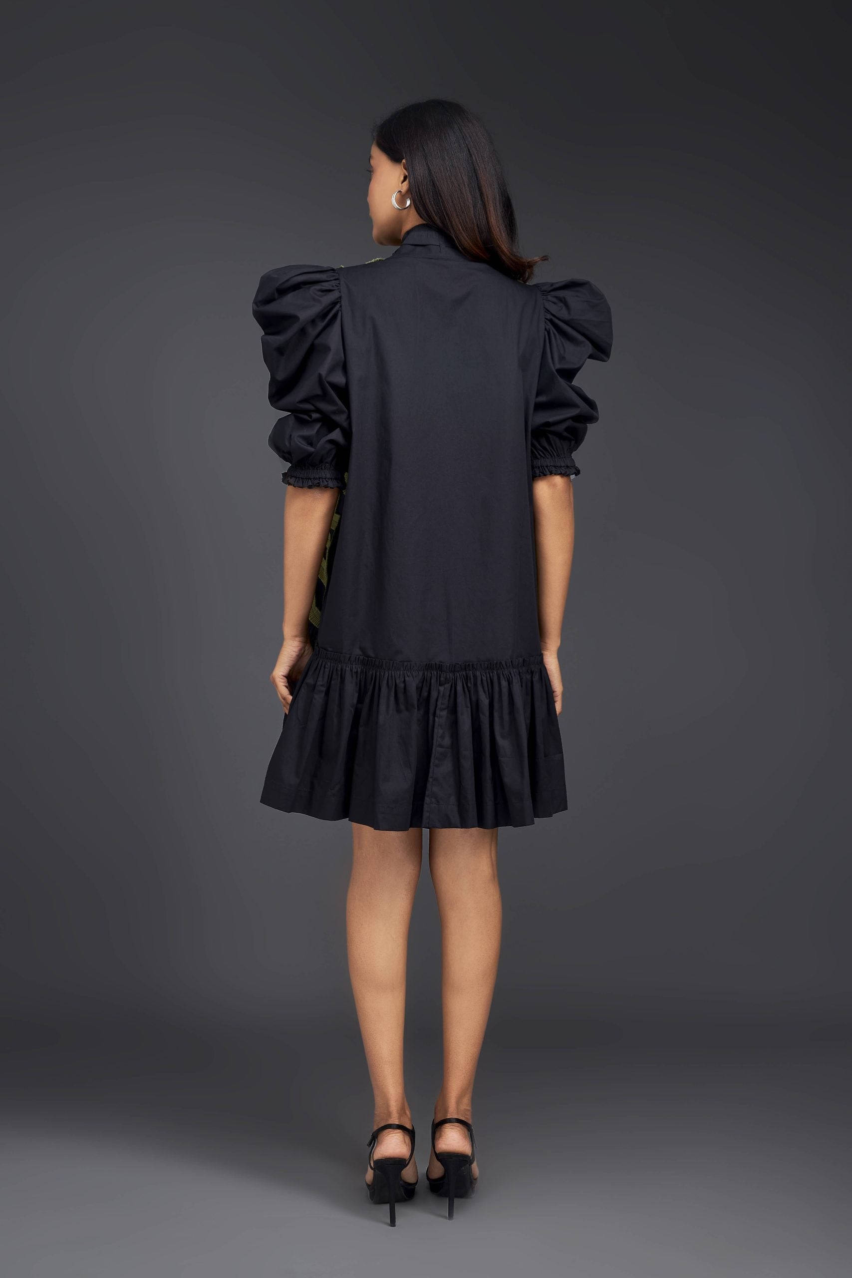 BLACK DRESS WITH GATHERED BOTTOM & PLEATED FRILL DETAILING ALL OVER FRONT.