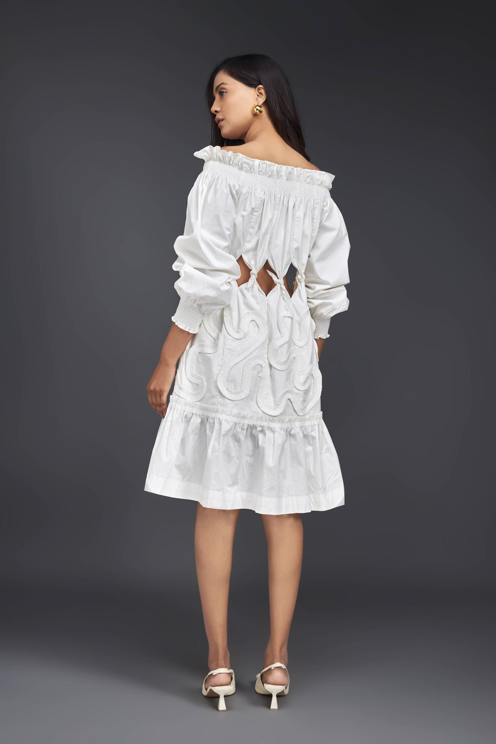 WHITE OFF-SHOULDER DRESS WITH WAIST CUTOUTS AND PLEATED FRILL DETAILING