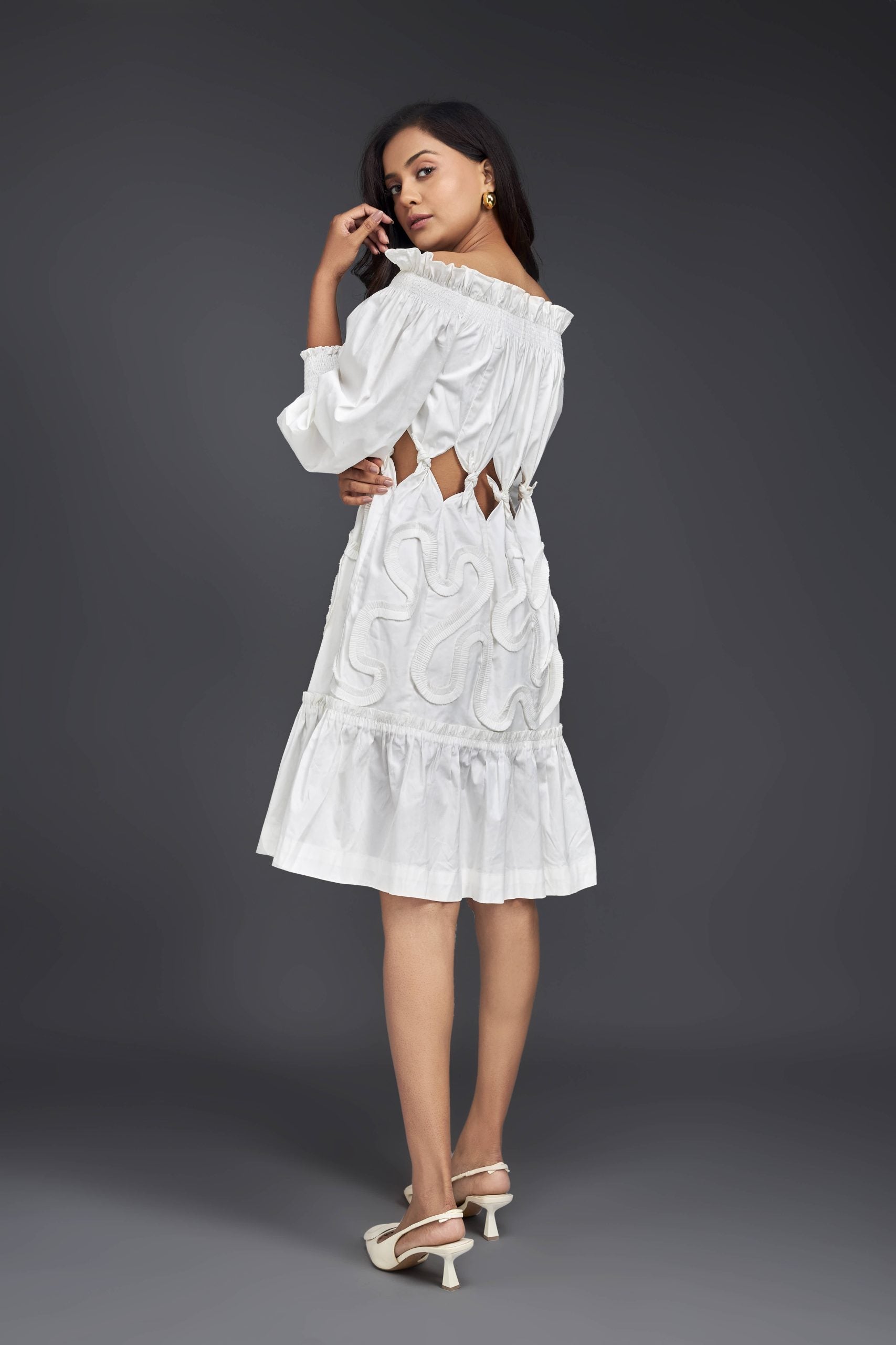 WHITE OFF-SHOULDER DRESS WITH WAIST CUTOUTS AND PLEATED FRILL DETAILING