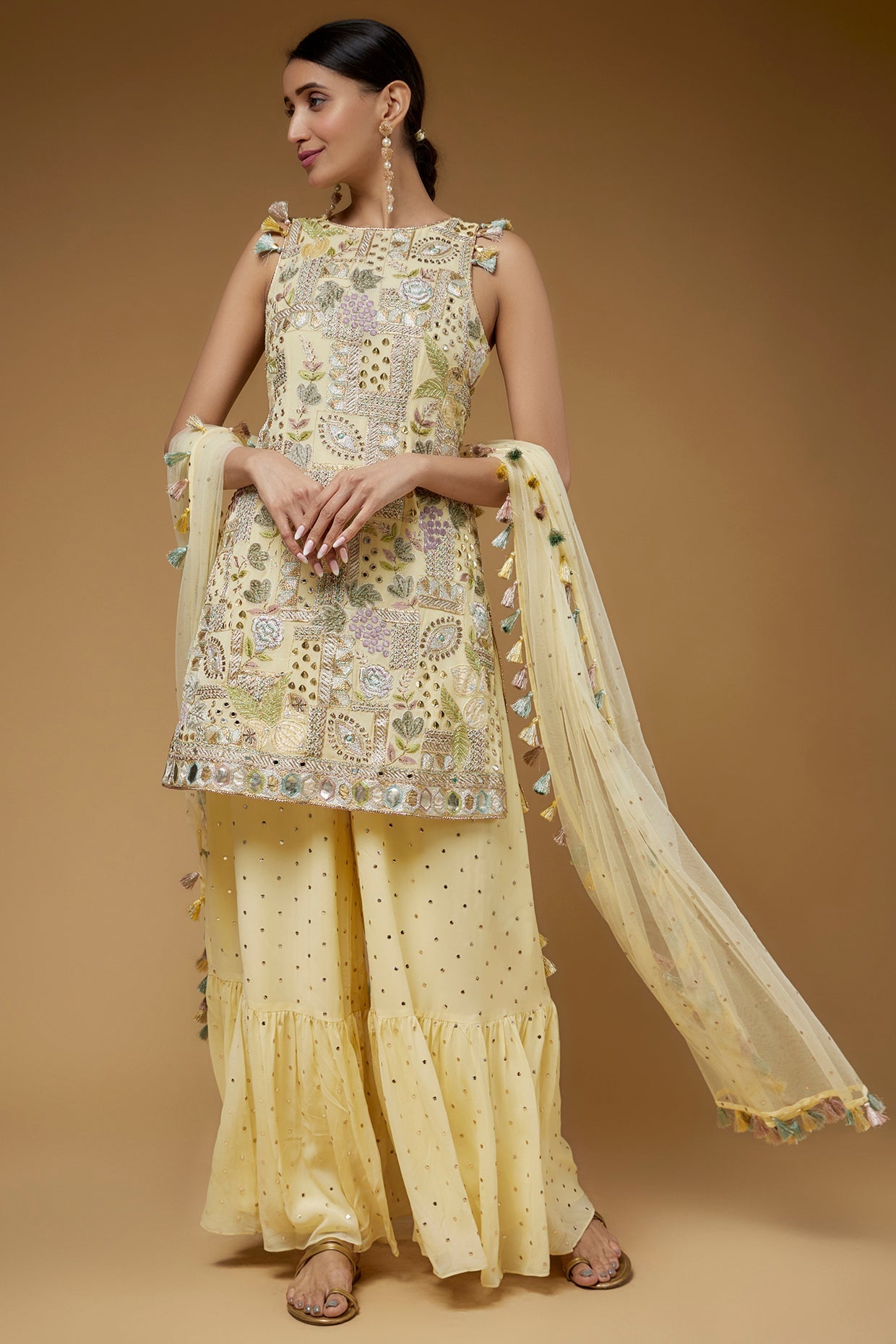 Pale Yellow Embroidered Back Tie-Up Kurta With One Frill Sharara And Dupatta