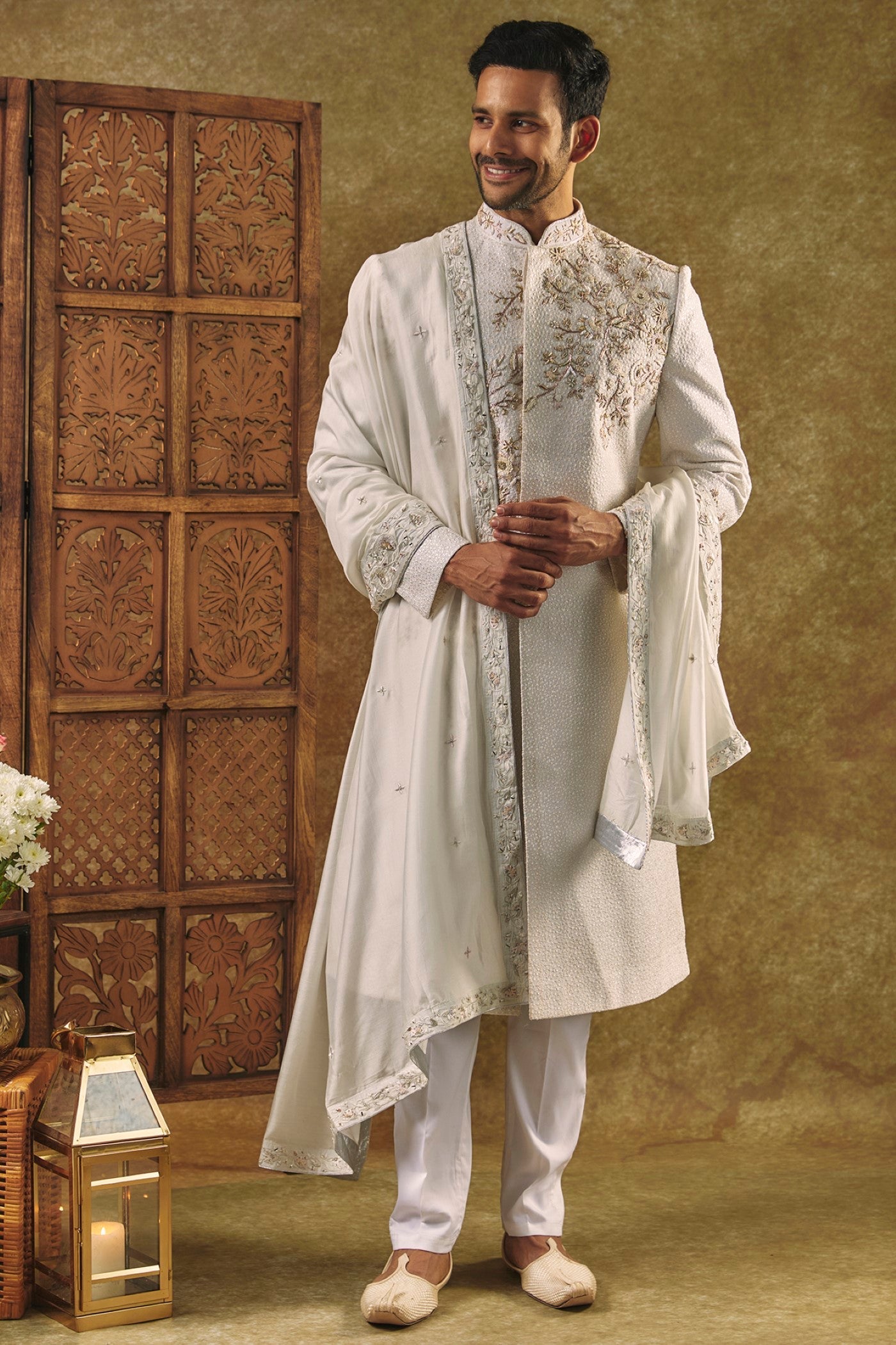 Ivory Sherwani set and dupatta with all over thread work