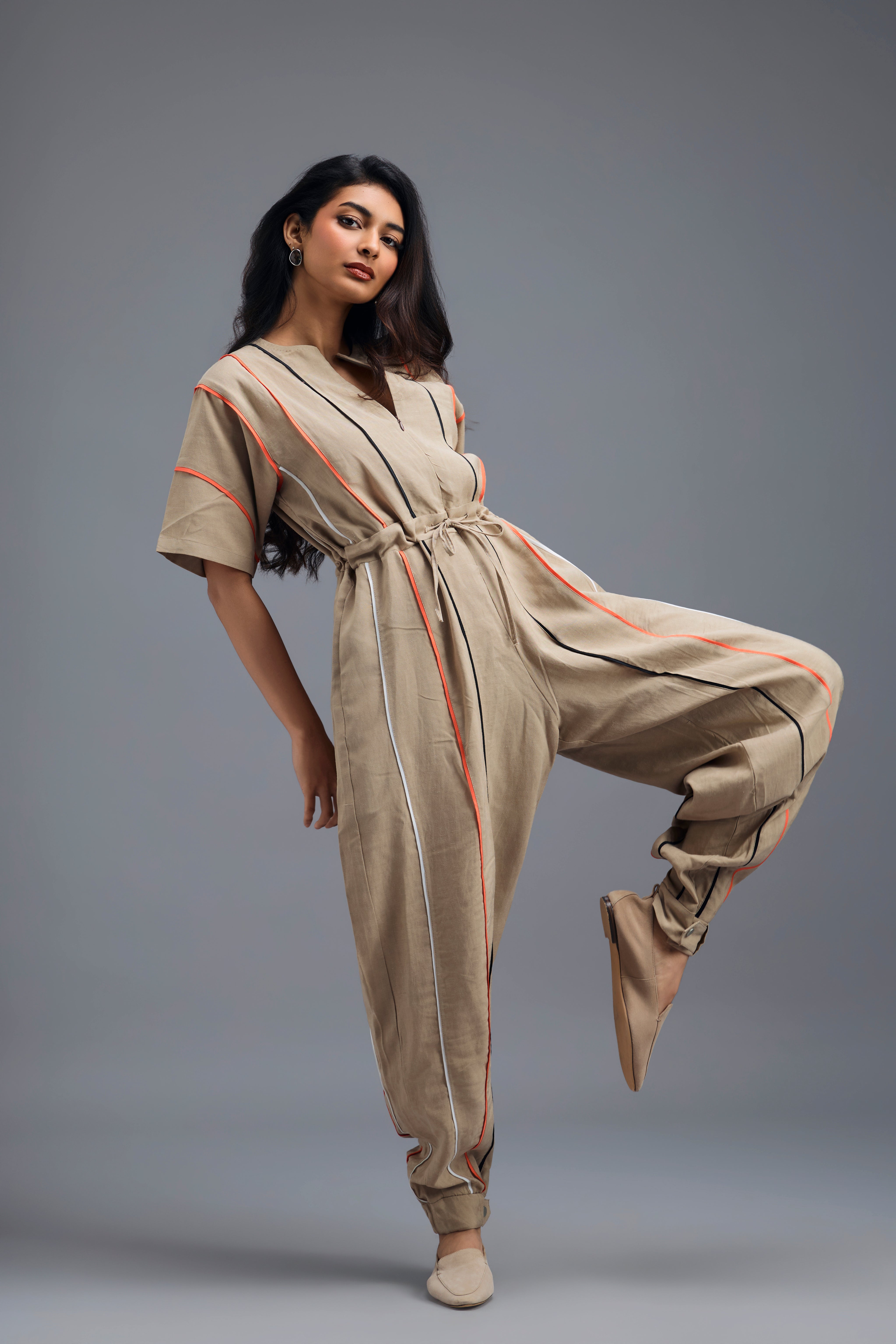 BEIGE ZIP-FRONT JUMPSUIT WITH NEON CONTRAST PIPING