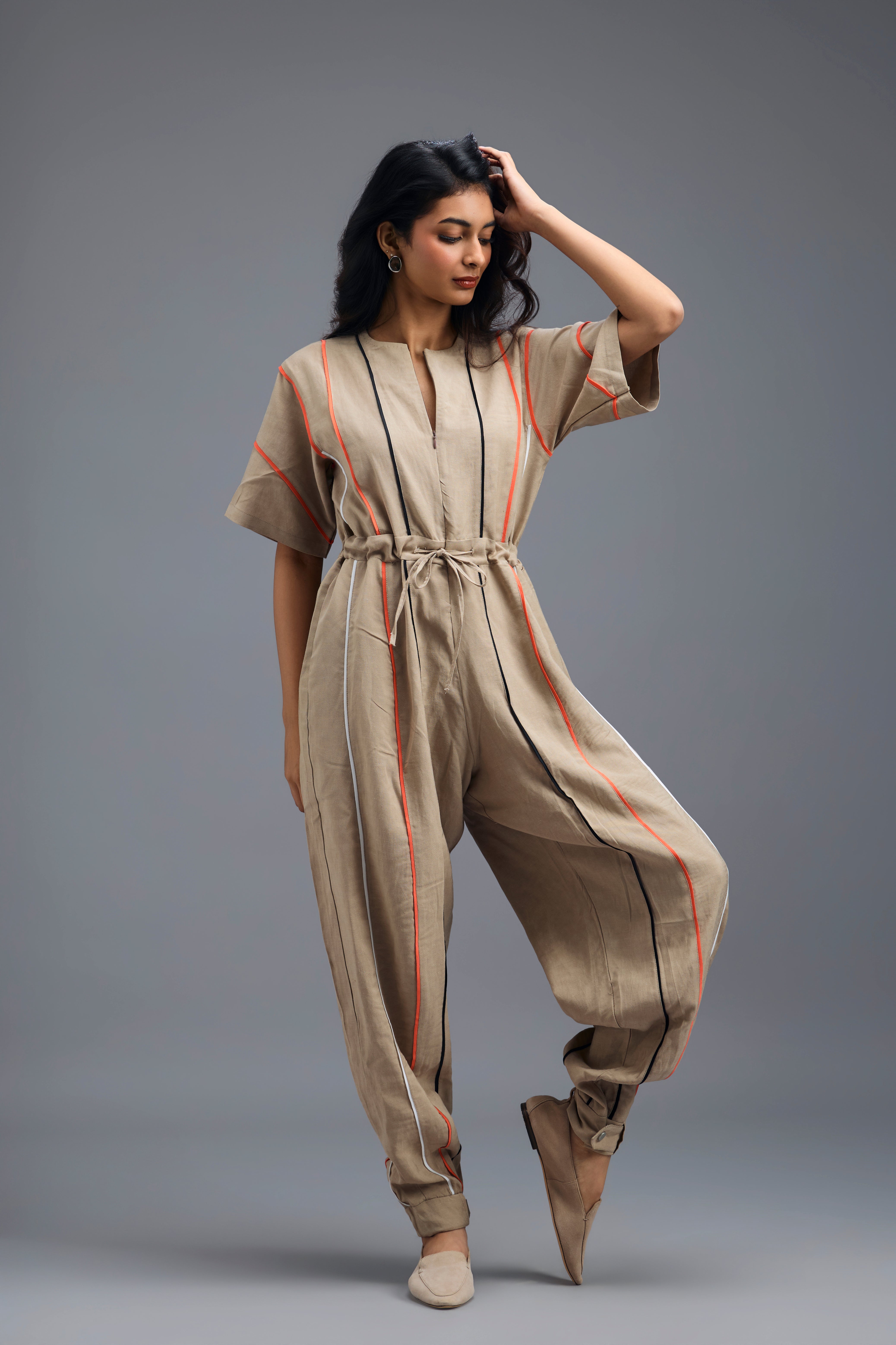 BEIGE ZIP-FRONT JUMPSUIT WITH NEON CONTRAST PIPING