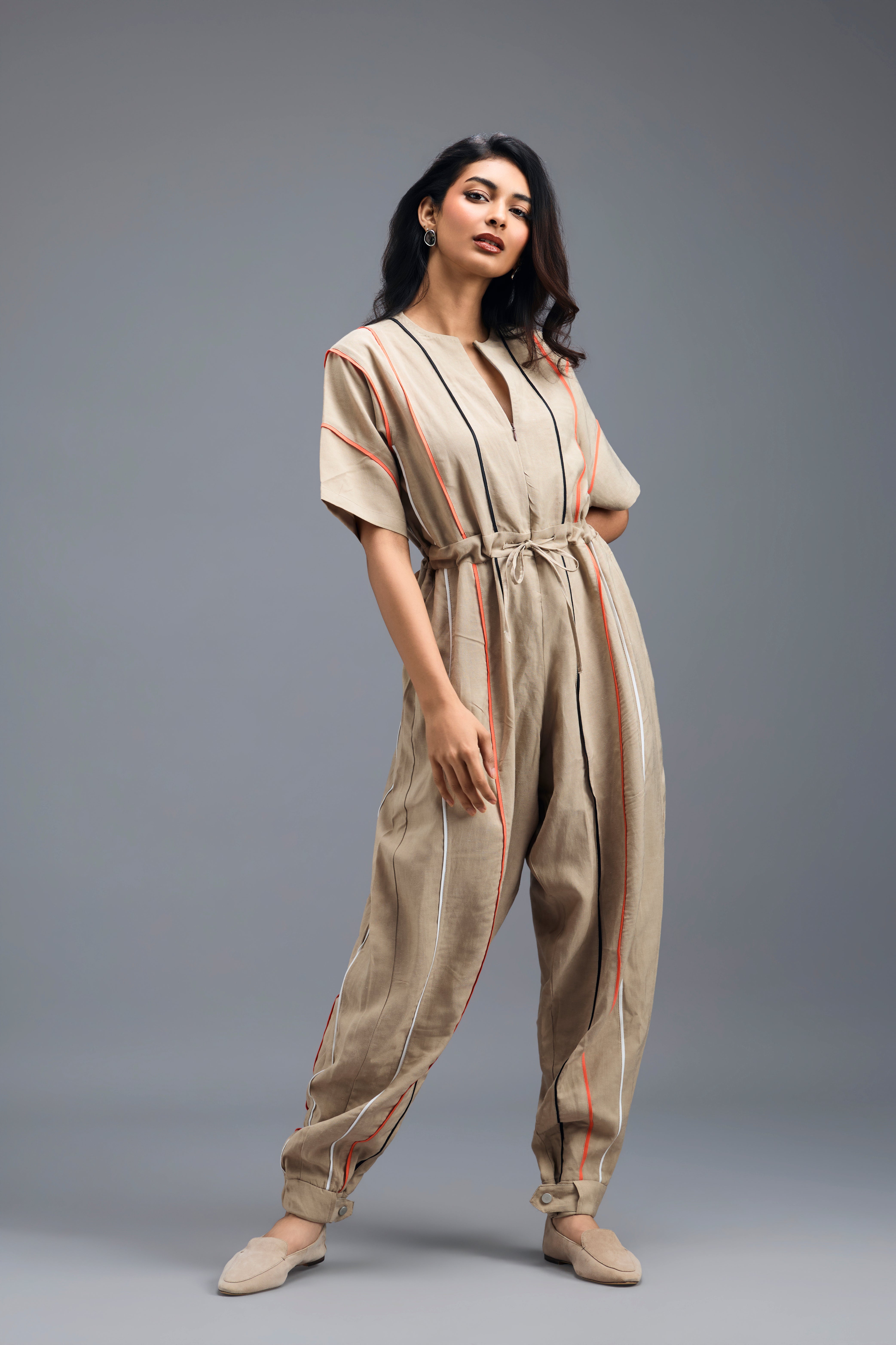 BEIGE ZIP-FRONT JUMPSUIT WITH NEON CONTRAST PIPING
