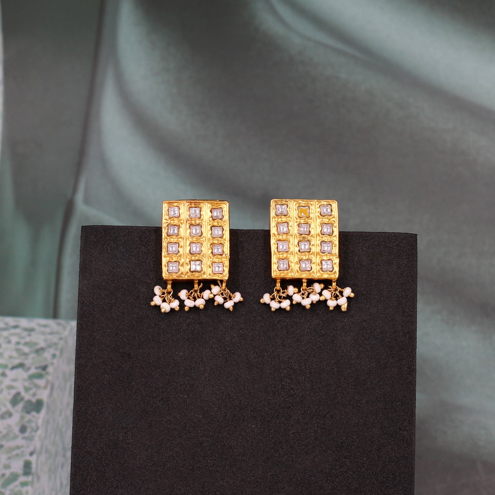 Golden Glow: Sangeeta Boochra Kundan Studded Earrings