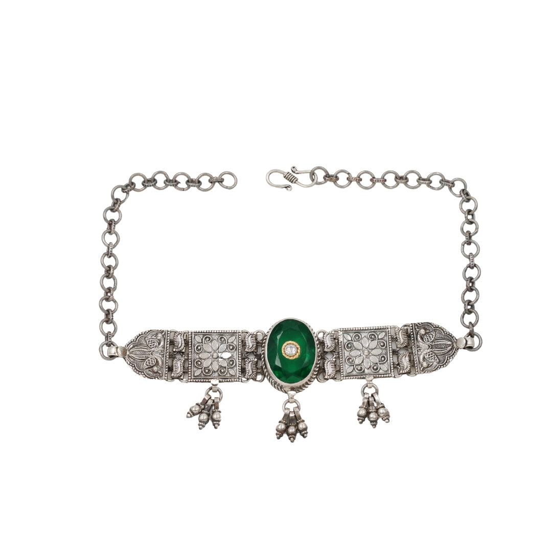 Majestic Glow: Sangeeta Boochra's Silver and Emerald Design