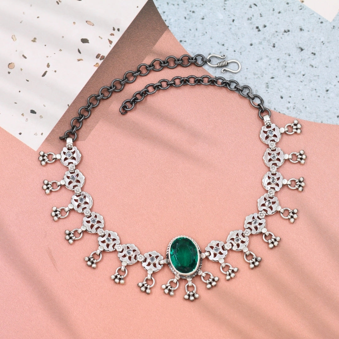 Majestic Glow: Sangeeta Boochra’s Silver Necklace with Emerald Accents