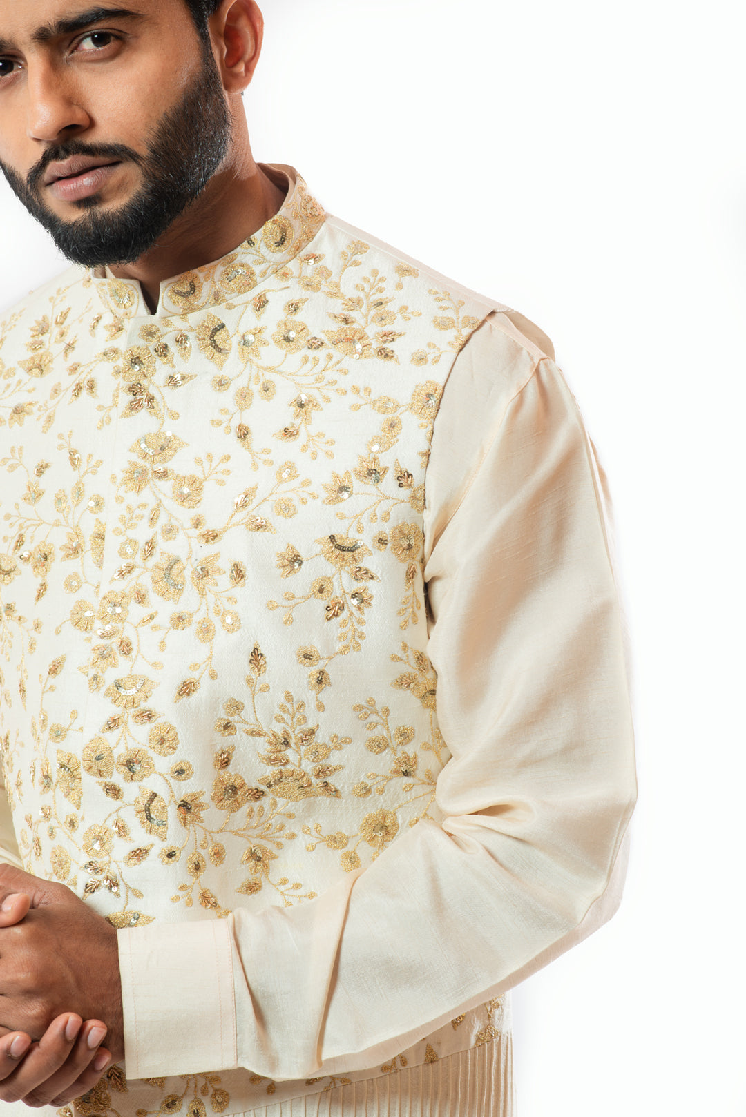 Soft Cream Nehru jacket and kurta set with hand embroidery.
