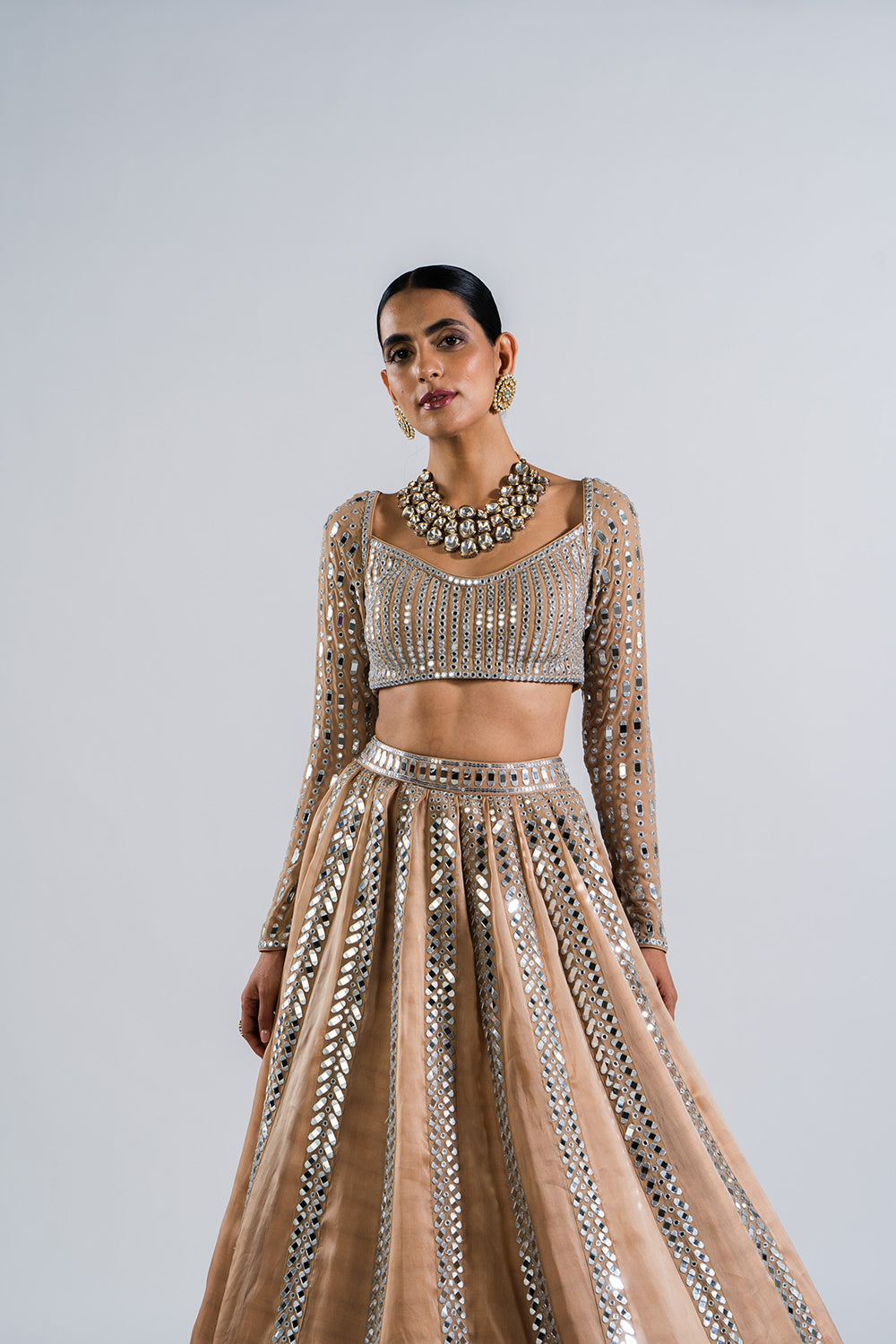 Beige Mirror Seam Lehenga Set.