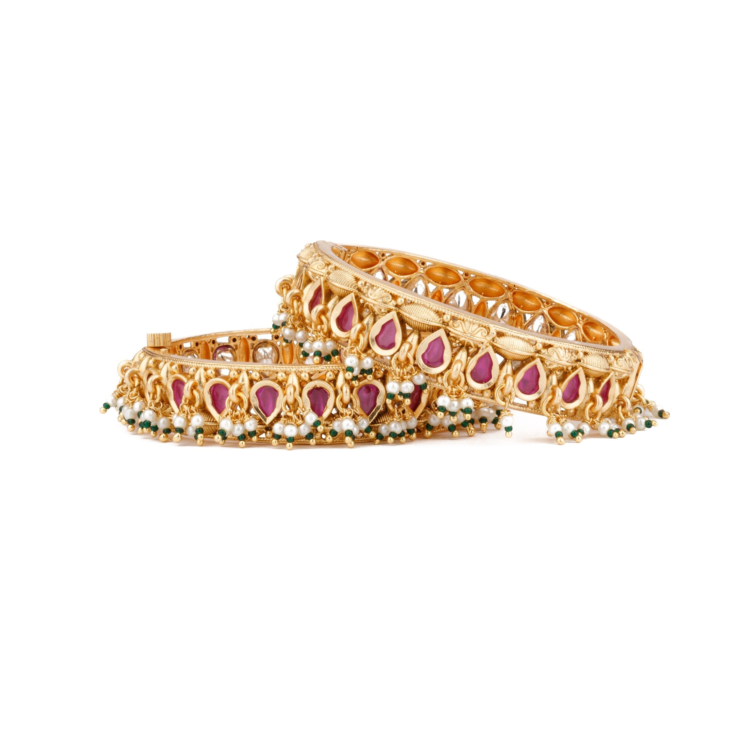 Image of Gold Plated Pink Onyx Stone Studded With Pearl Drop Bangles, Set of 2