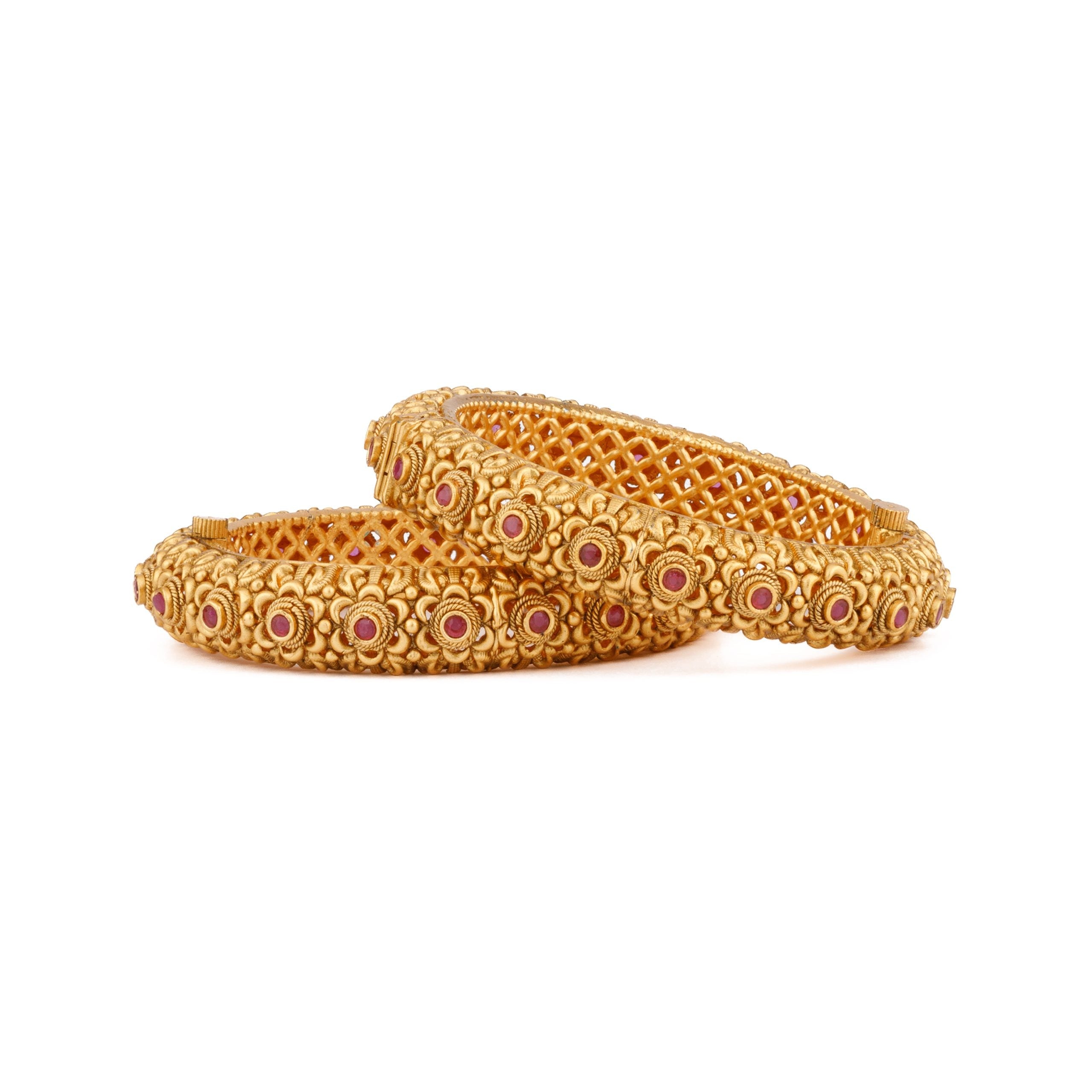 Image of Gold Plated Pink Onyx Stone Studded Flower Motif Temple Bangles, Set of 2