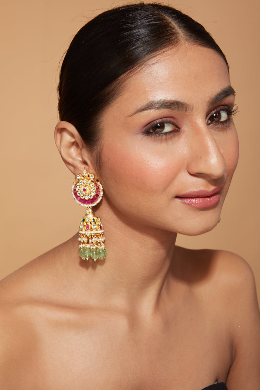 Gold Plated Kundan Studded With Pink Synthetic Stone Green Beads Drop Jhumka Earrings