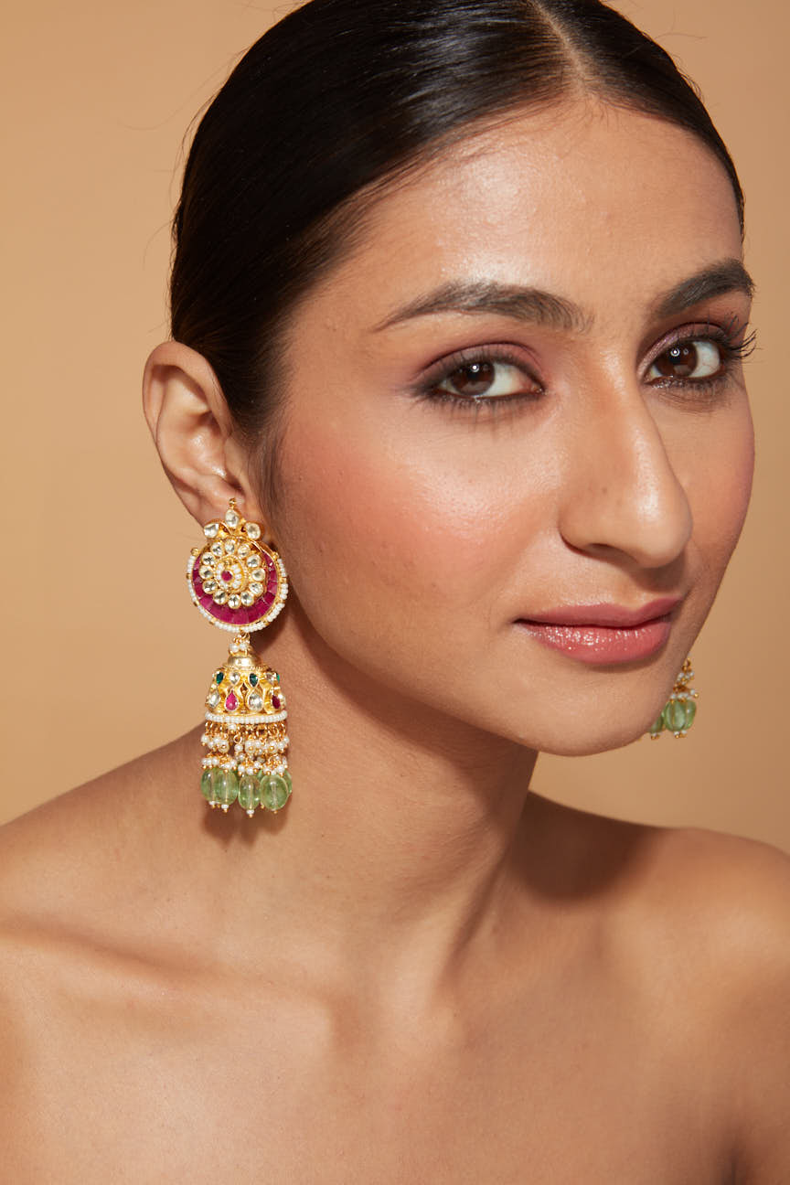 Gold Plated Kundan Studded With Pink Synthetic Stone Green Beads Drop Jhumka Earrings