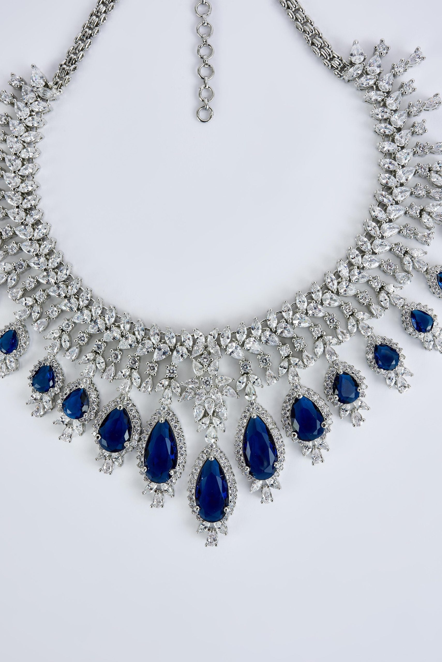 vivinia BY VIDHI MEHRA Zia Silver Plated Blue Womens Zircon Short Necklace Set with Pair of Dangler Earrings & Maangtikka (Freesize)