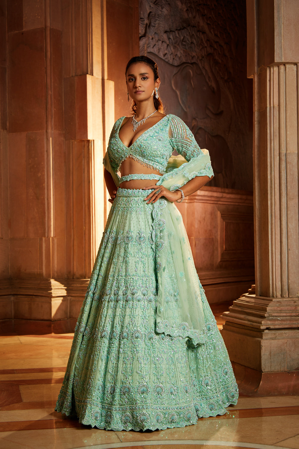 Vibrant Mint Green Tulle Lehenga Choli with Embroidered Belt