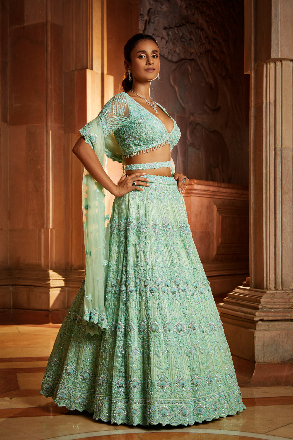 Vibrant Mint Green Tulle Lehenga Choli with Embroidered Belt
