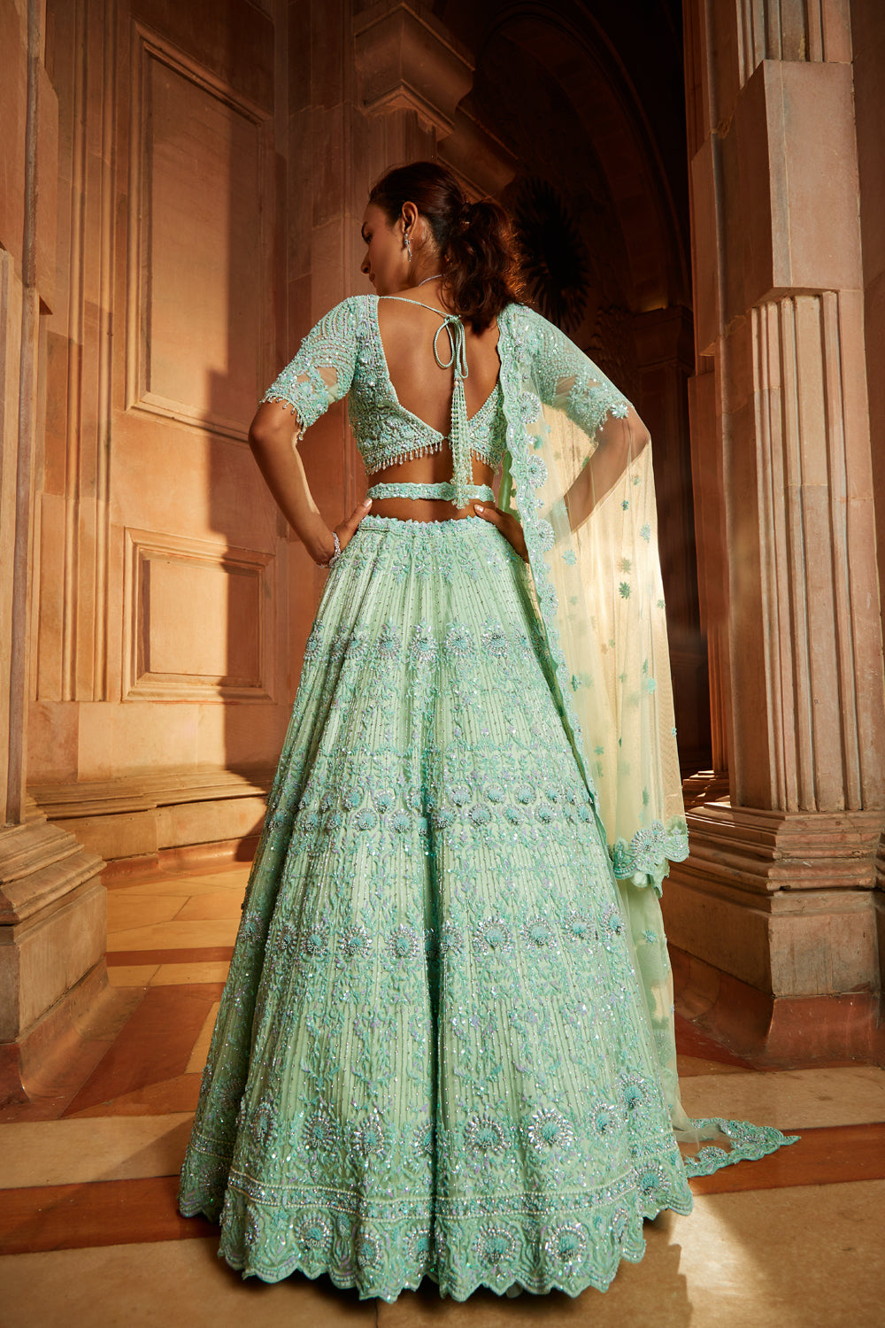 Vibrant Mint Green Tulle Lehenga Choli with Embroidered Belt