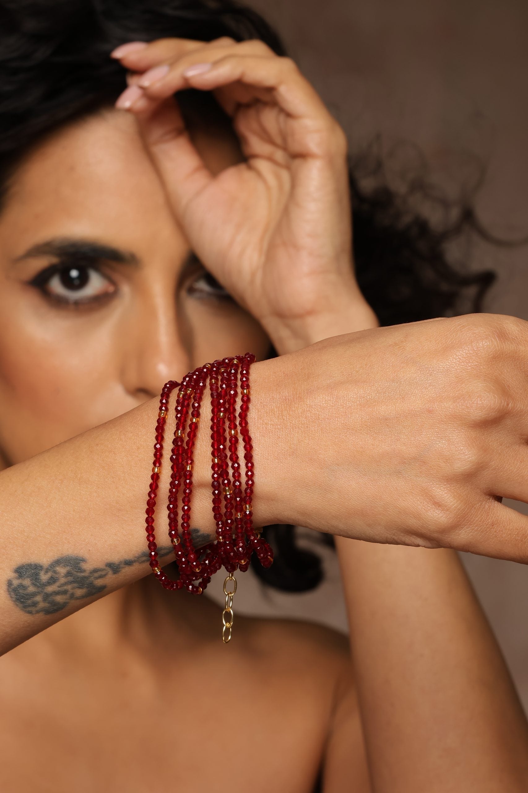 Red Gold Tone Beaded Bracelet