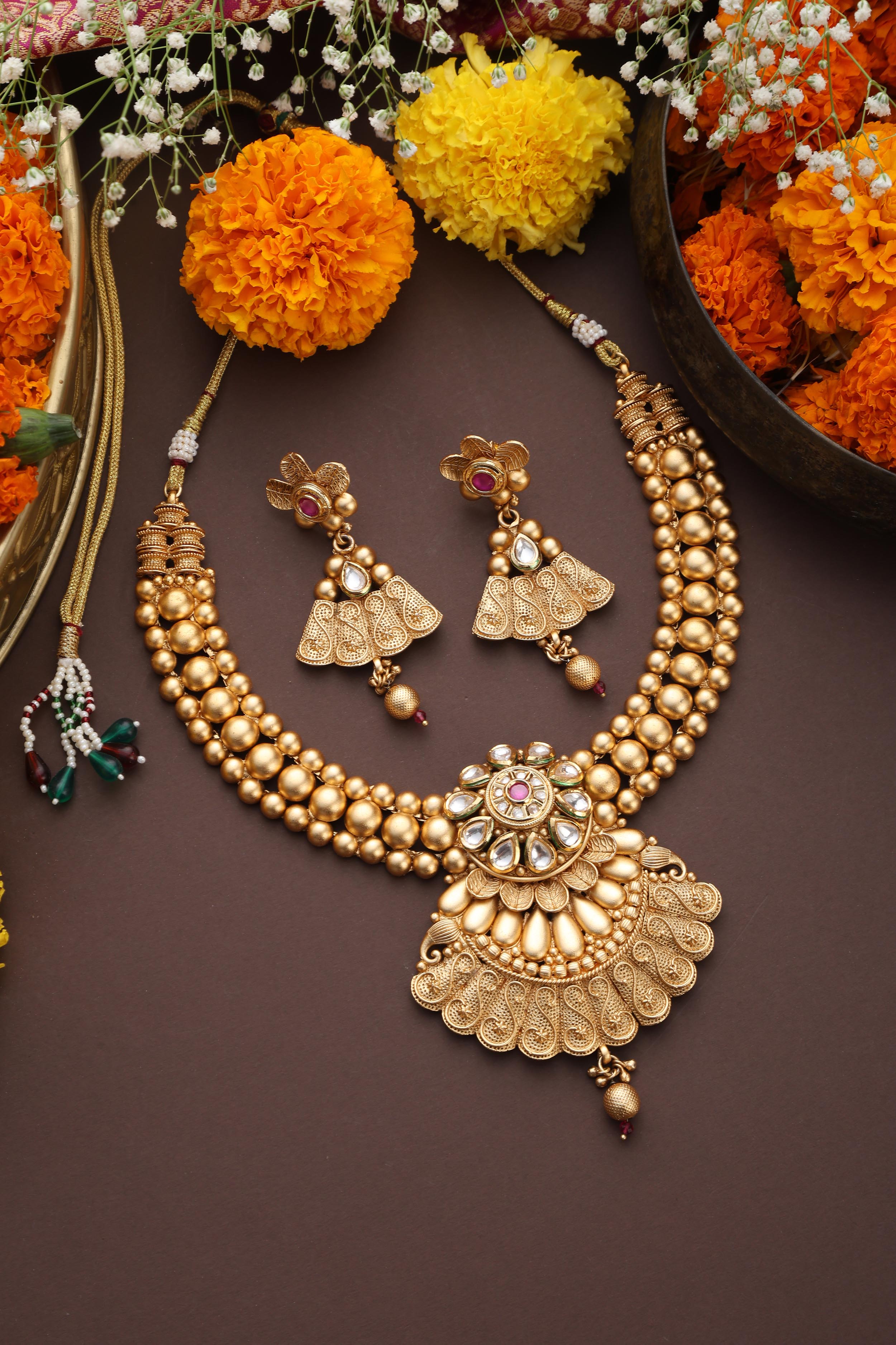 Gold Tone Temple Necklace Set