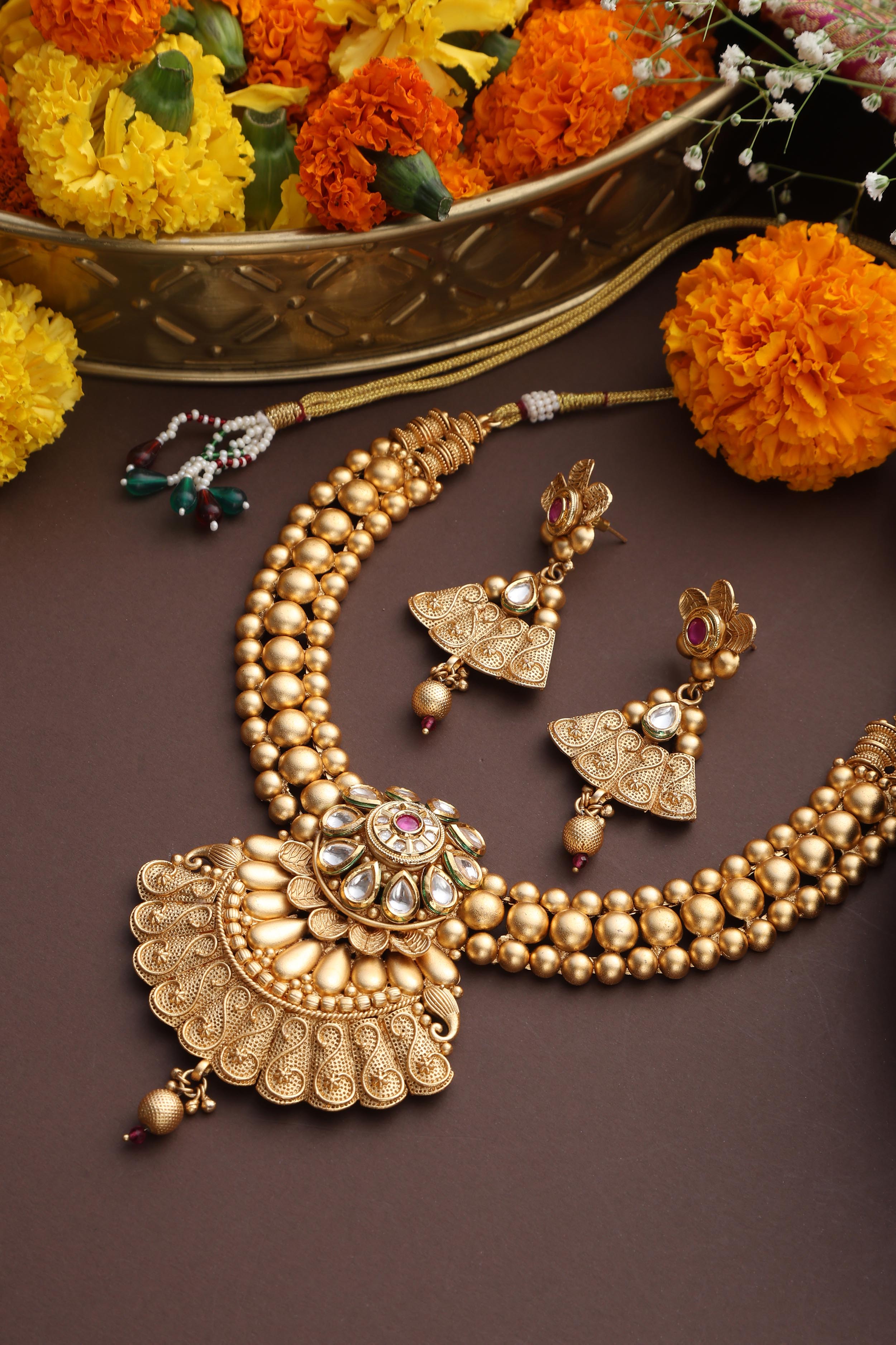 Gold Tone Temple Necklace Set