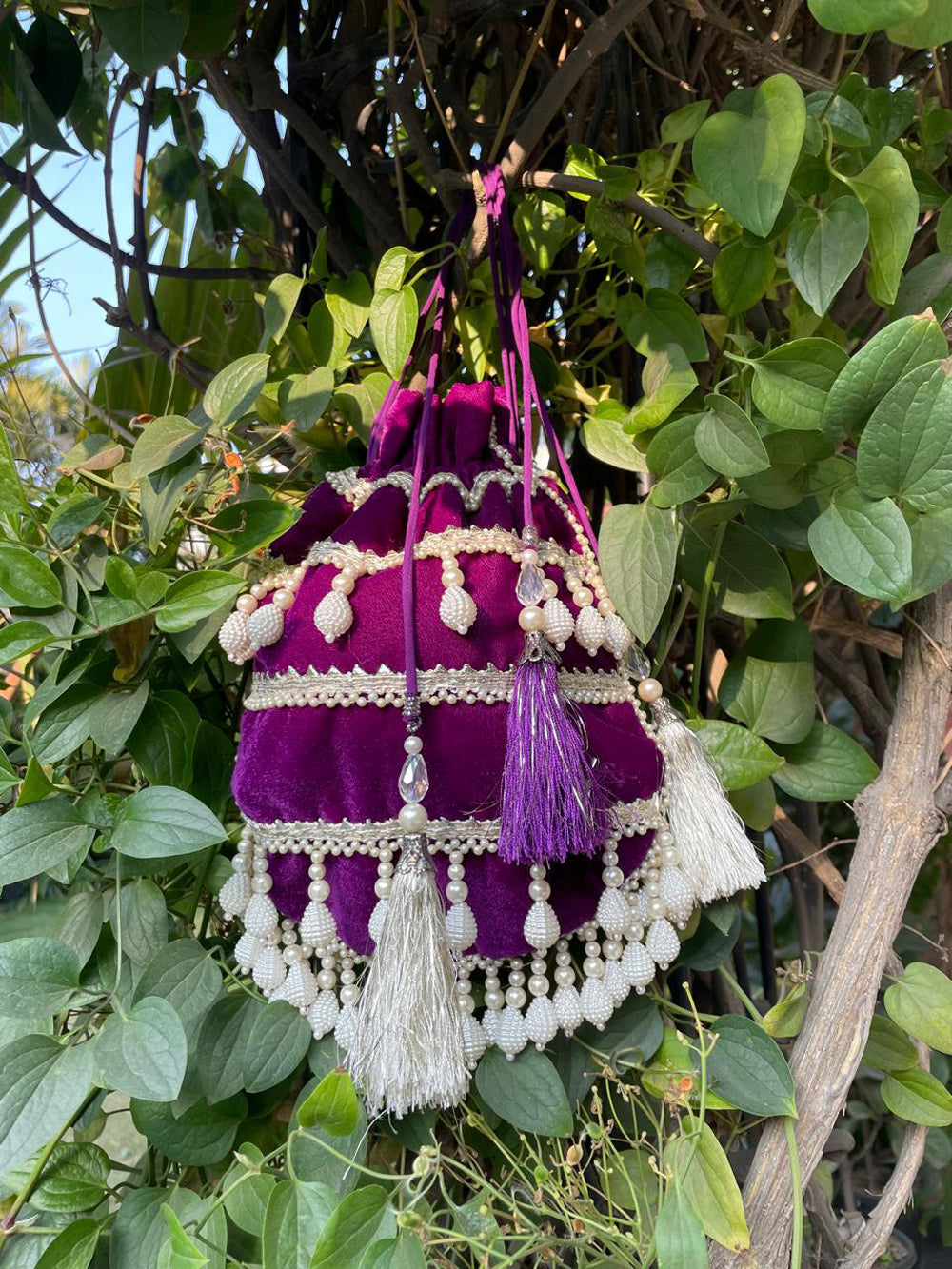 Elegant Purple Velvet Potli Bag with Pearl Detailing for Weddings
