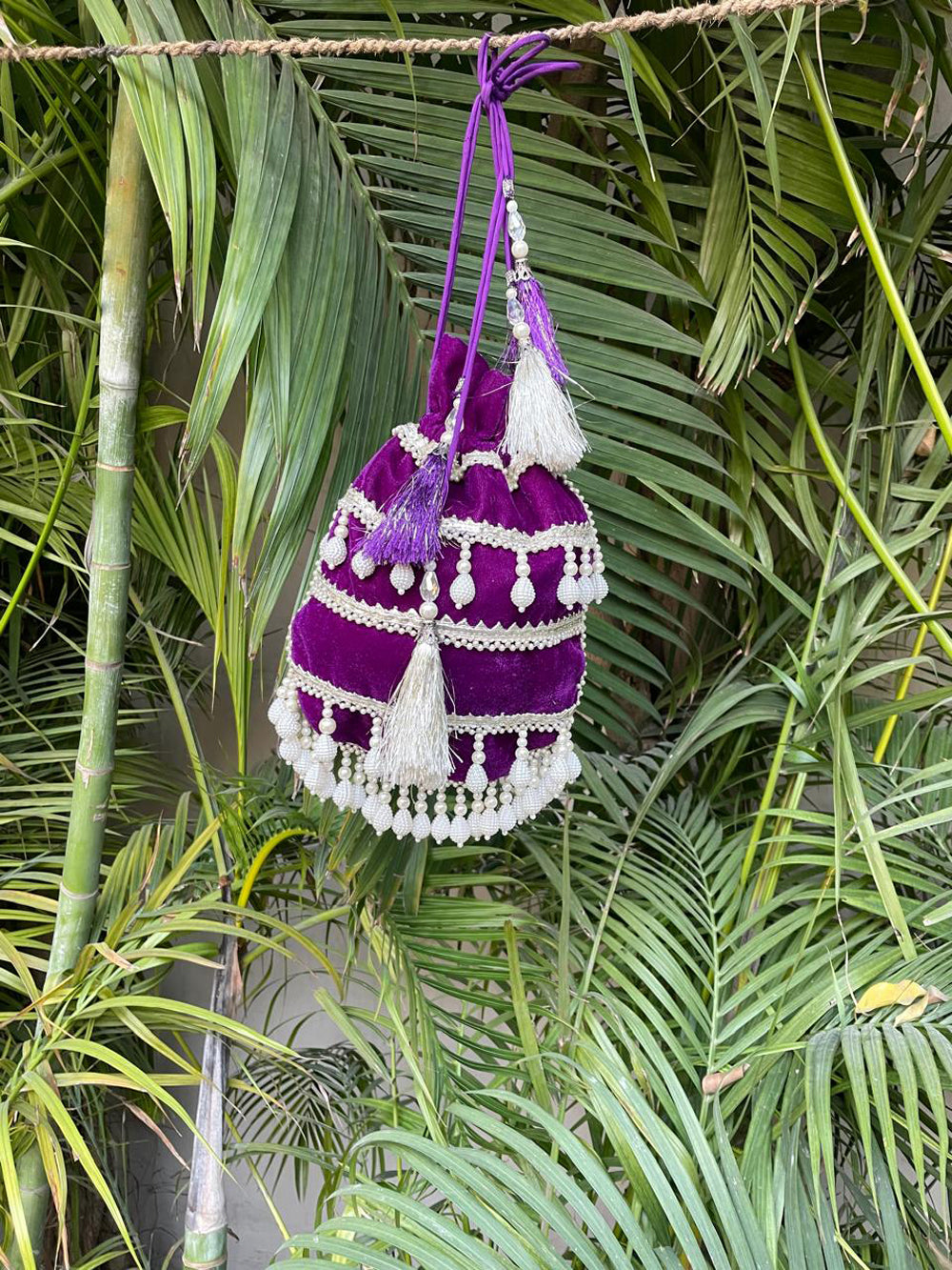 Elegant Purple Velvet Potli Bag with Pearl Detailing for Weddings