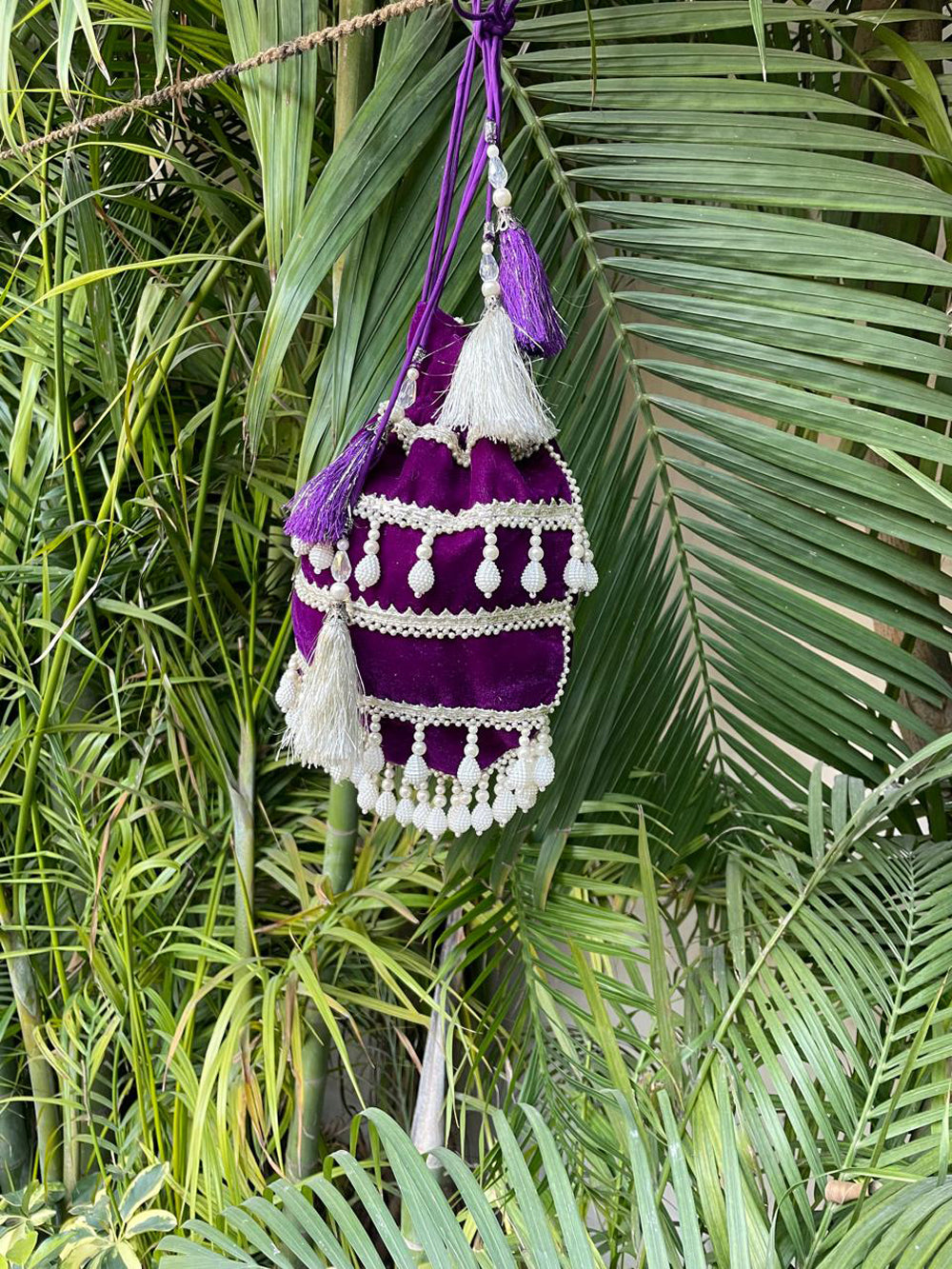 Elegant Purple Velvet Potli Bag with Pearl Detailing for Weddings
