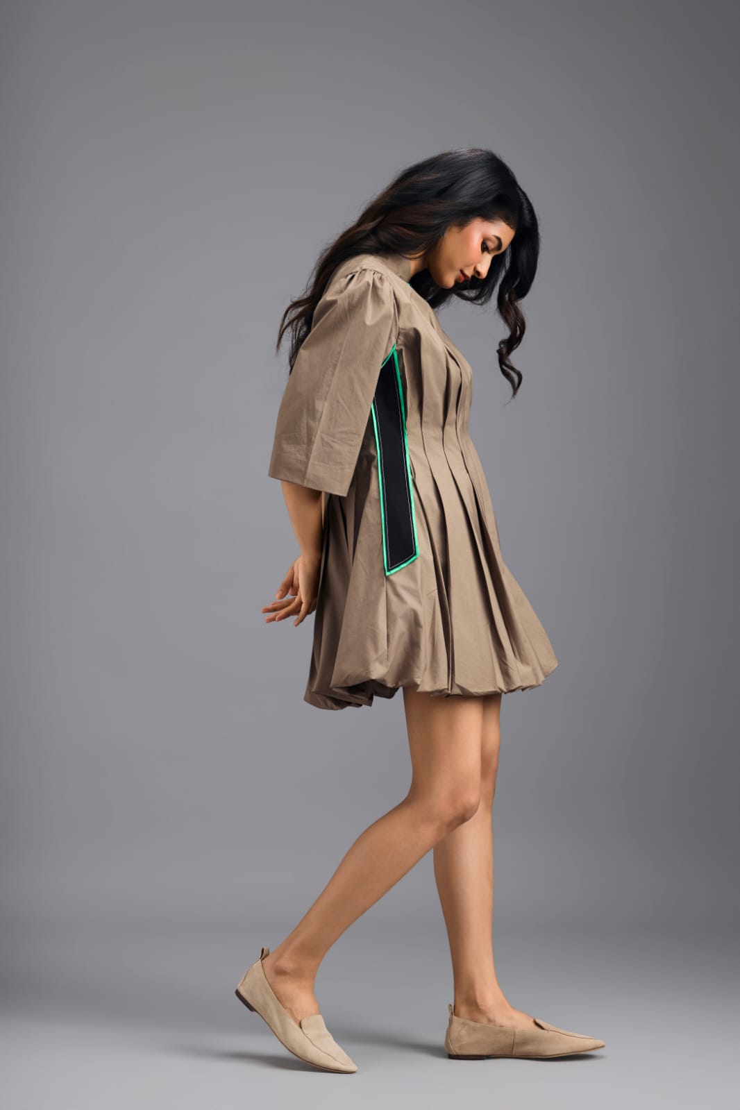 MUD PLEATED MINI DRESS WITH NEON PANELLED SIDE DETAIL AND BUBBLE HEM