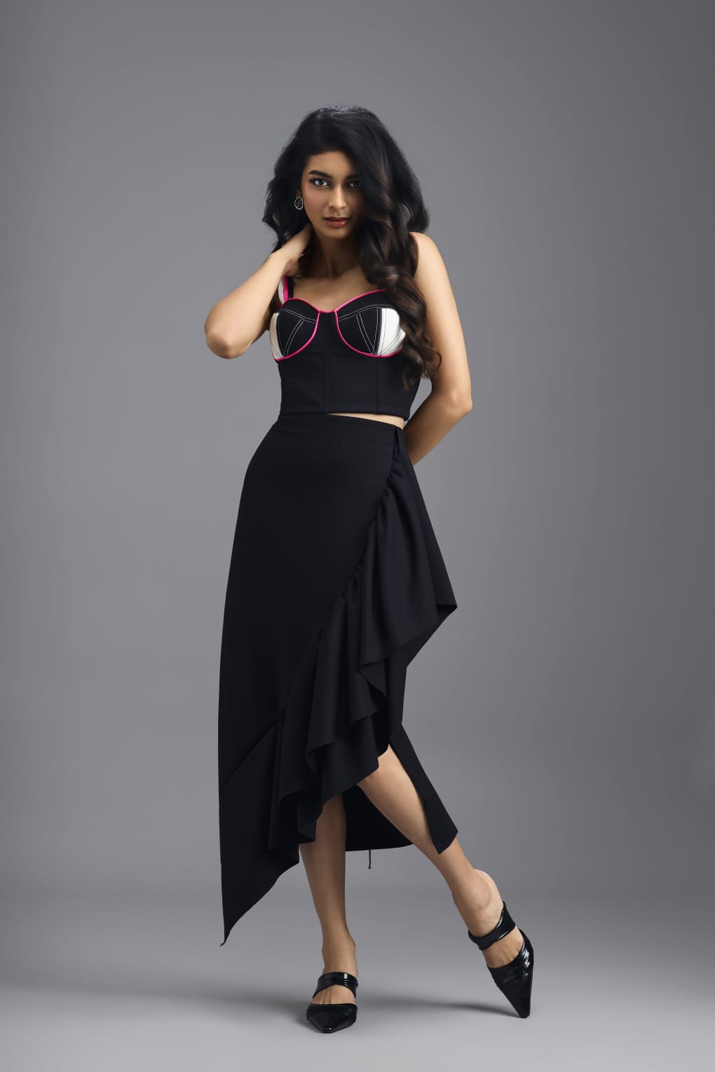 BLACK CO-ORD SET WITH NEON PIPED CORSET TOP AND ASYMMETRIC RUFFLE SKIRT