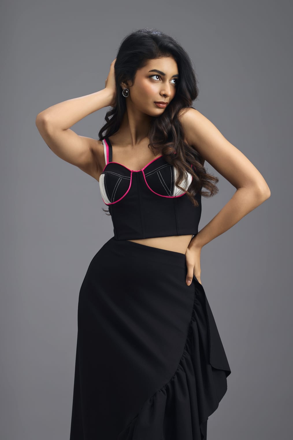 BLACK CO-ORD SET WITH NEON PIPED CORSET TOP AND ASYMMETRIC RUFFLE SKIRT