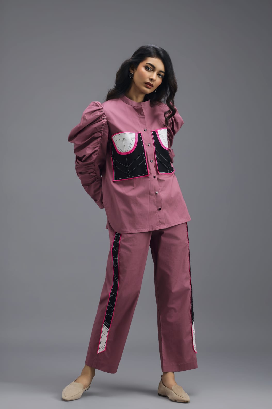 PINK TAILORED PANTS WITH NEON GEOMETRIC POCKET PANEL DETAIL