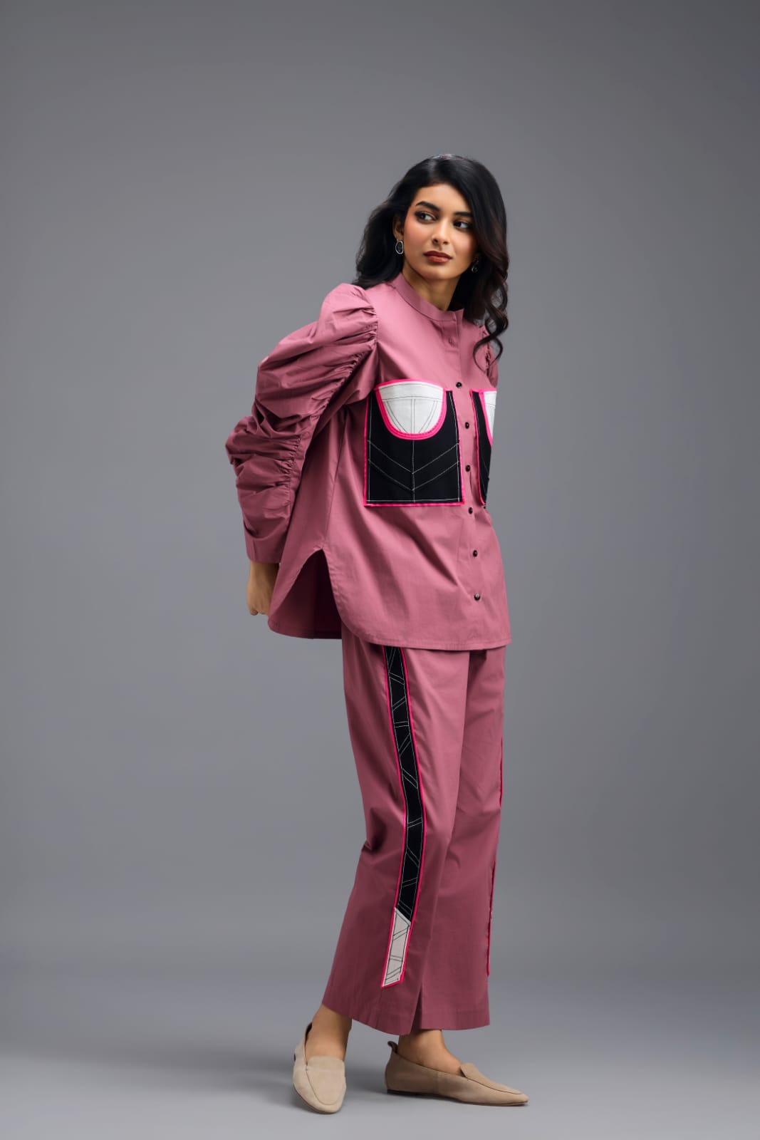 PINK TAILORED PANTS WITH NEON GEOMETRIC POCKET PANEL DETAIL