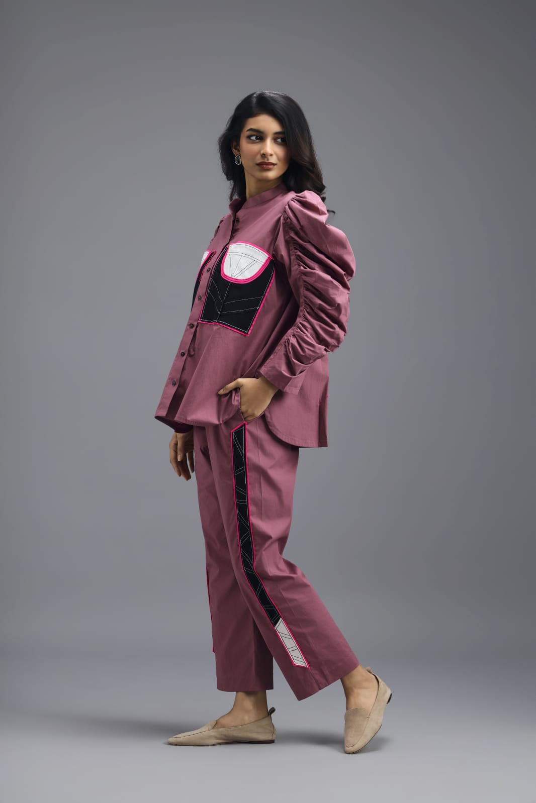 PINK TAILORED PANTS WITH NEON GEOMETRIC POCKET PANEL DETAIL