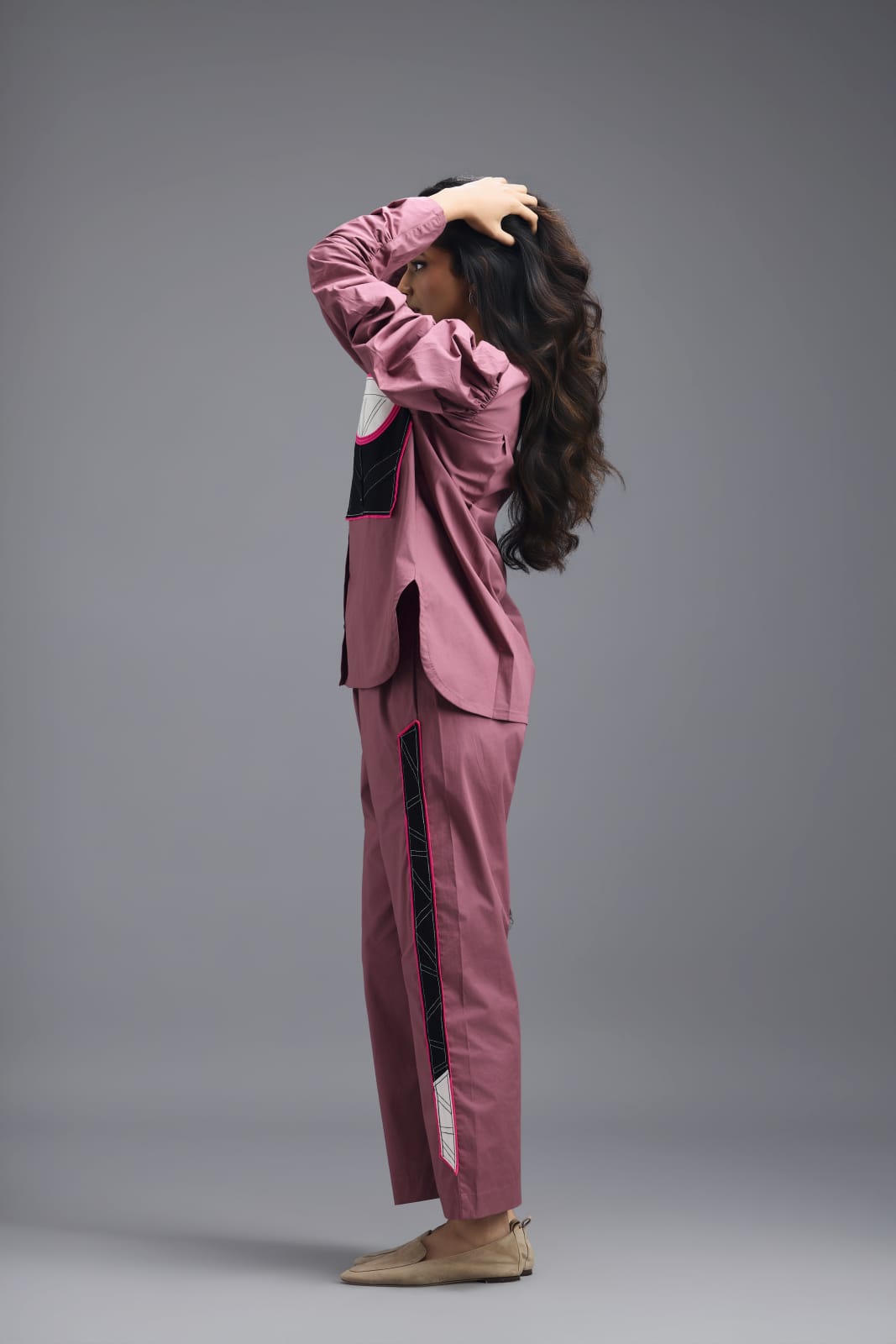 PINK TAILORED PANTS WITH NEON GEOMETRIC POCKET PANEL DETAIL