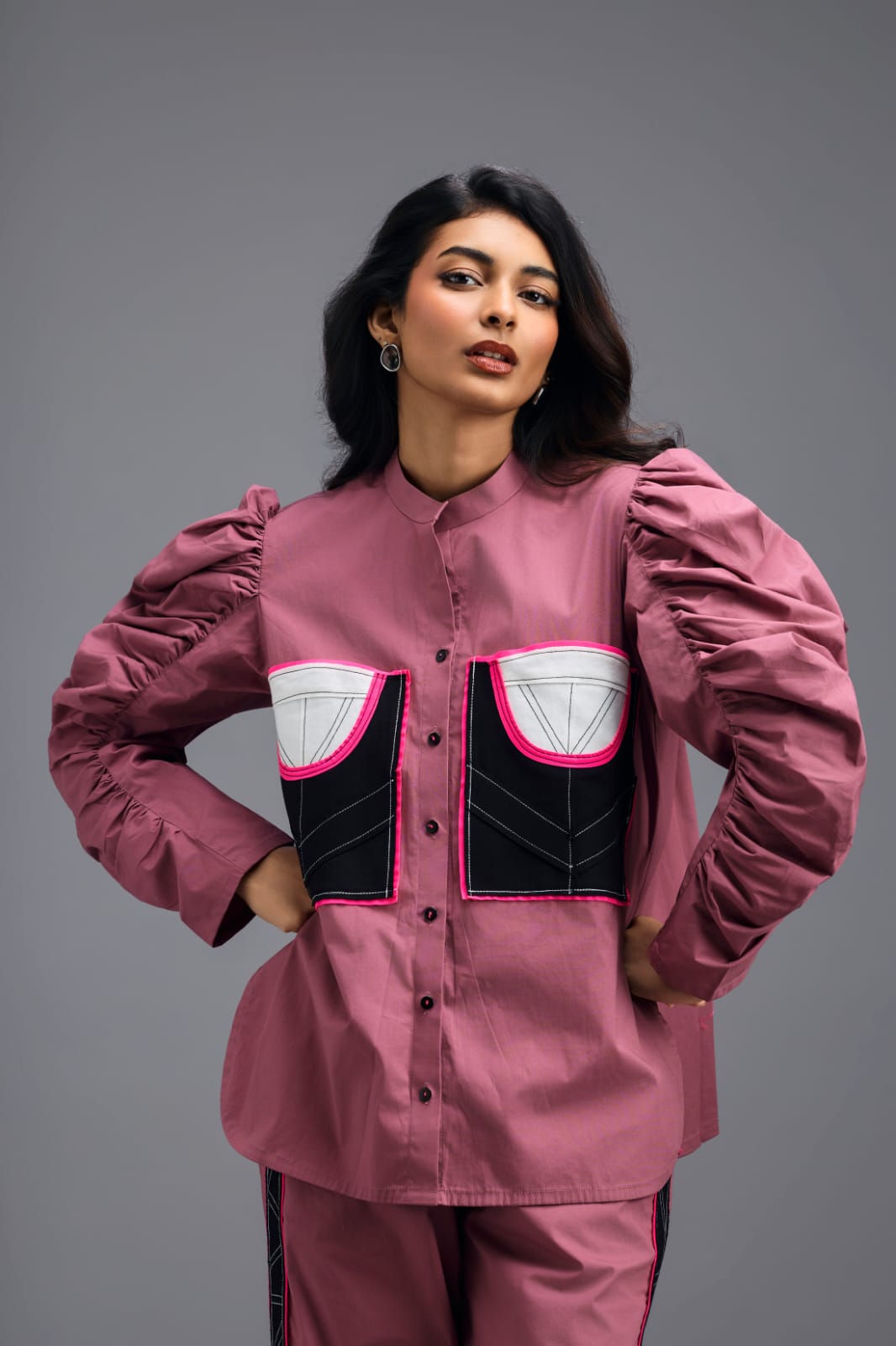 PINK TAILORED PANTS WITH NEON GEOMETRIC POCKET PANEL DETAIL