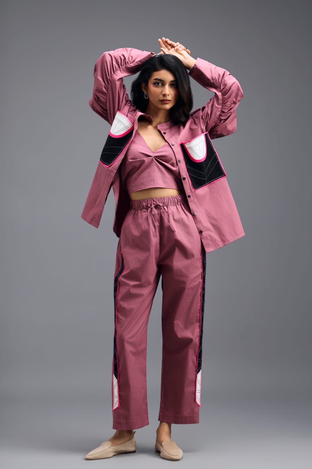 PINK CO-ORD SET WITH NEON GEOMETRIC PANEL DETAIL, BRALETTE AND ELASTICATED PANTS