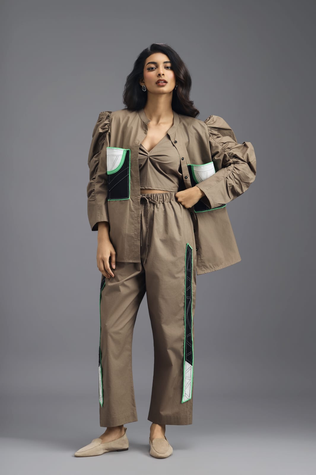 MUD TAILORED PANTS WITH NEON GEOMETRIC POCKET PANEL DETAIL