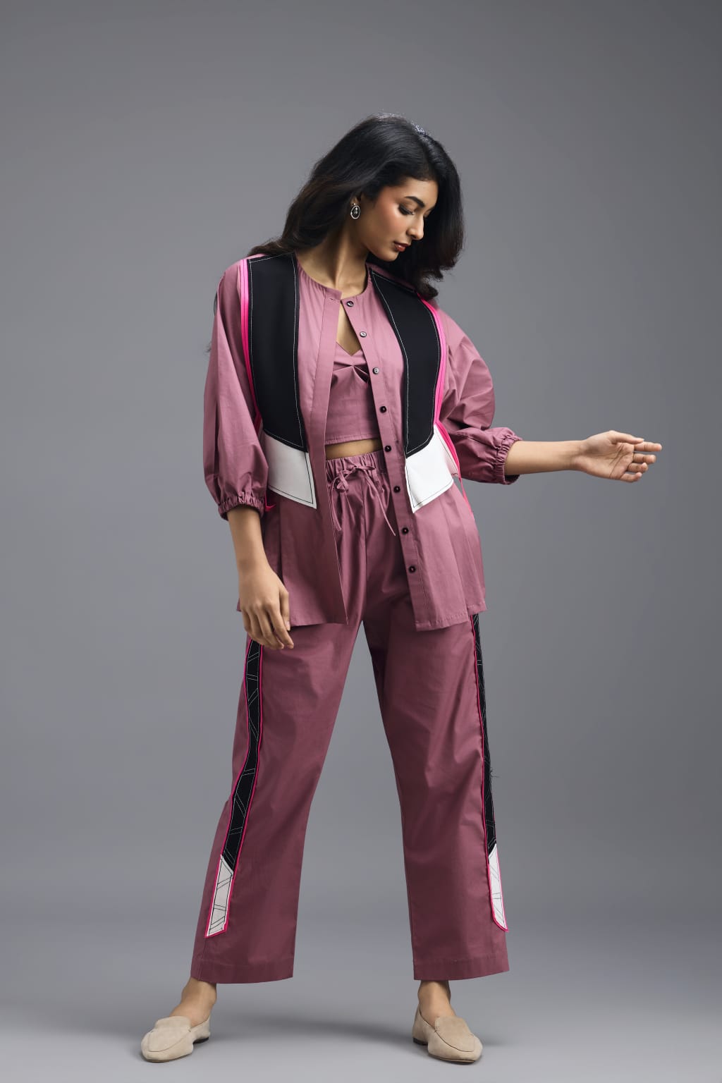 PINK TAILORED PANTS WITH NEON GEOMETRIC SIDE PANEL DETAIL