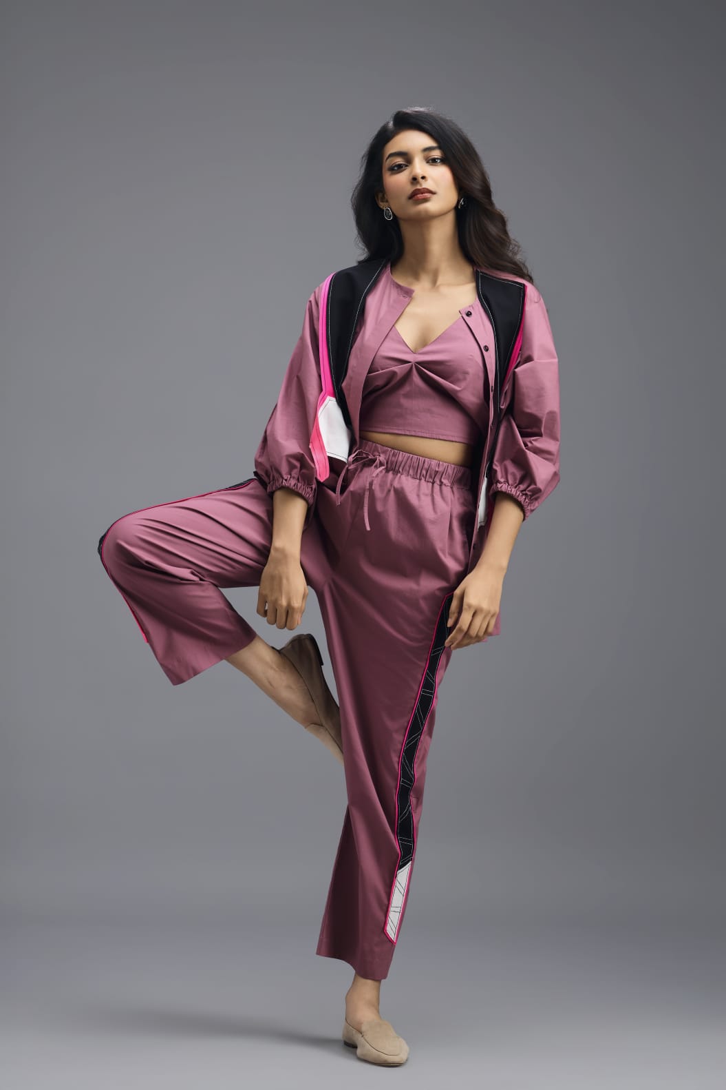 PINK TAILORED PANTS WITH NEON GEOMETRIC SIDE PANEL DETAIL