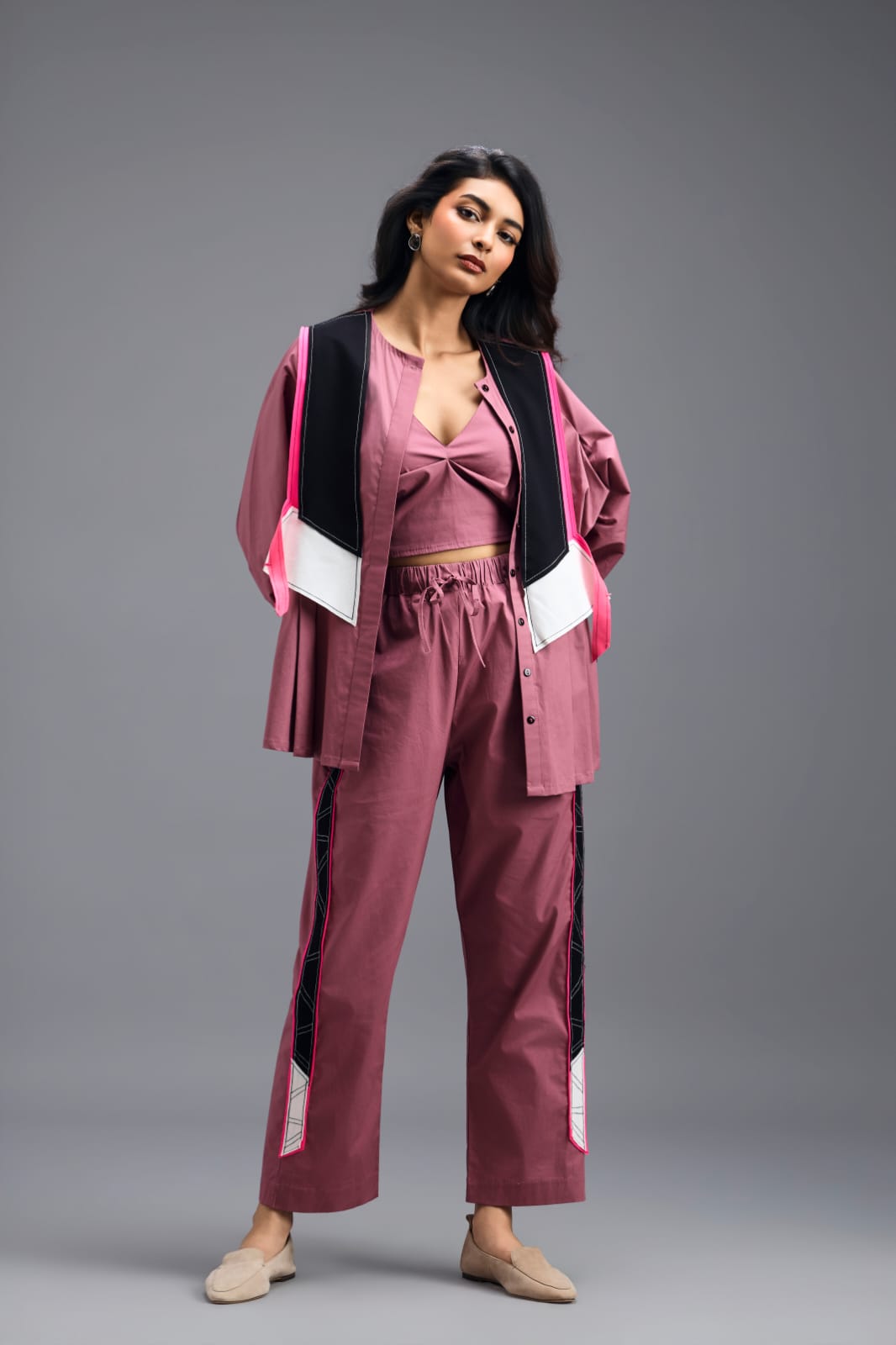 PINK TAILORED PANTS WITH NEON GEOMETRIC SIDE PANEL DETAIL