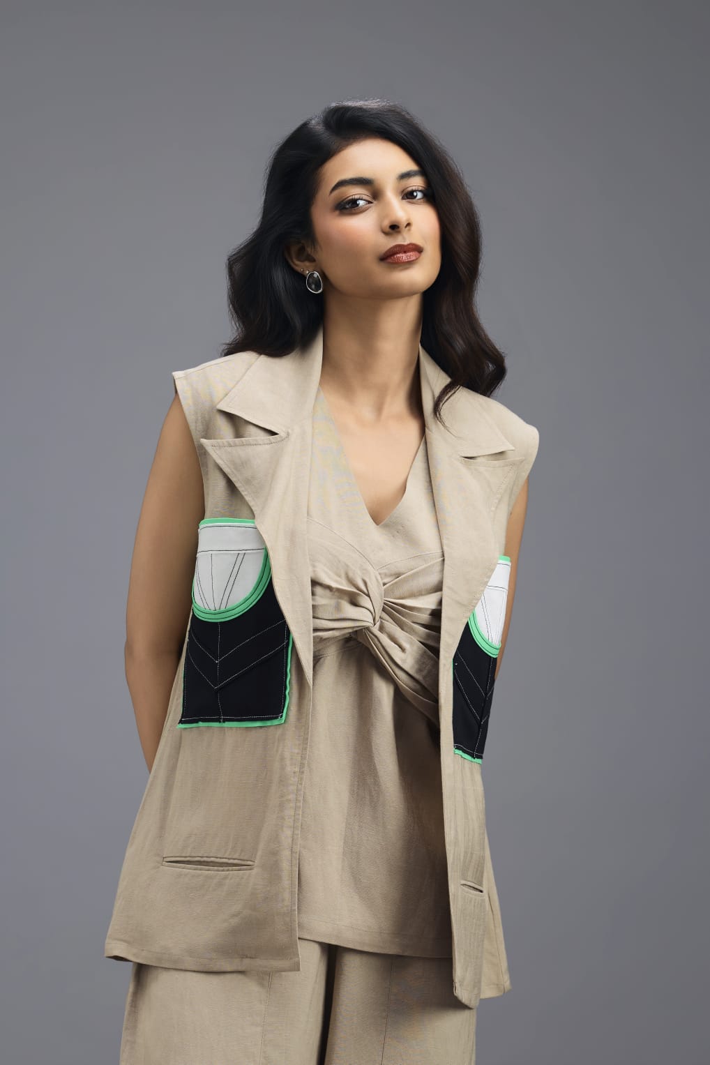 BEIGE CO-ORD SET WITH NEON GEOMETRIC PANELLED BLAZER, TWISTED TOP AND TROUSERS
