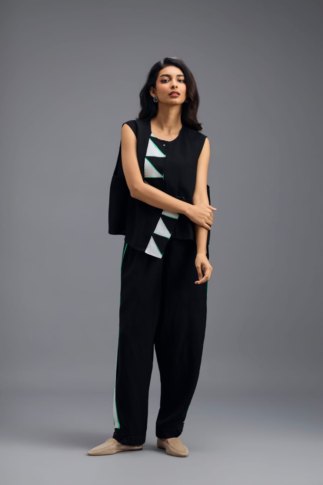 BLACK JACKET WITH NEON PIPED GEOMETRIC DETAIL