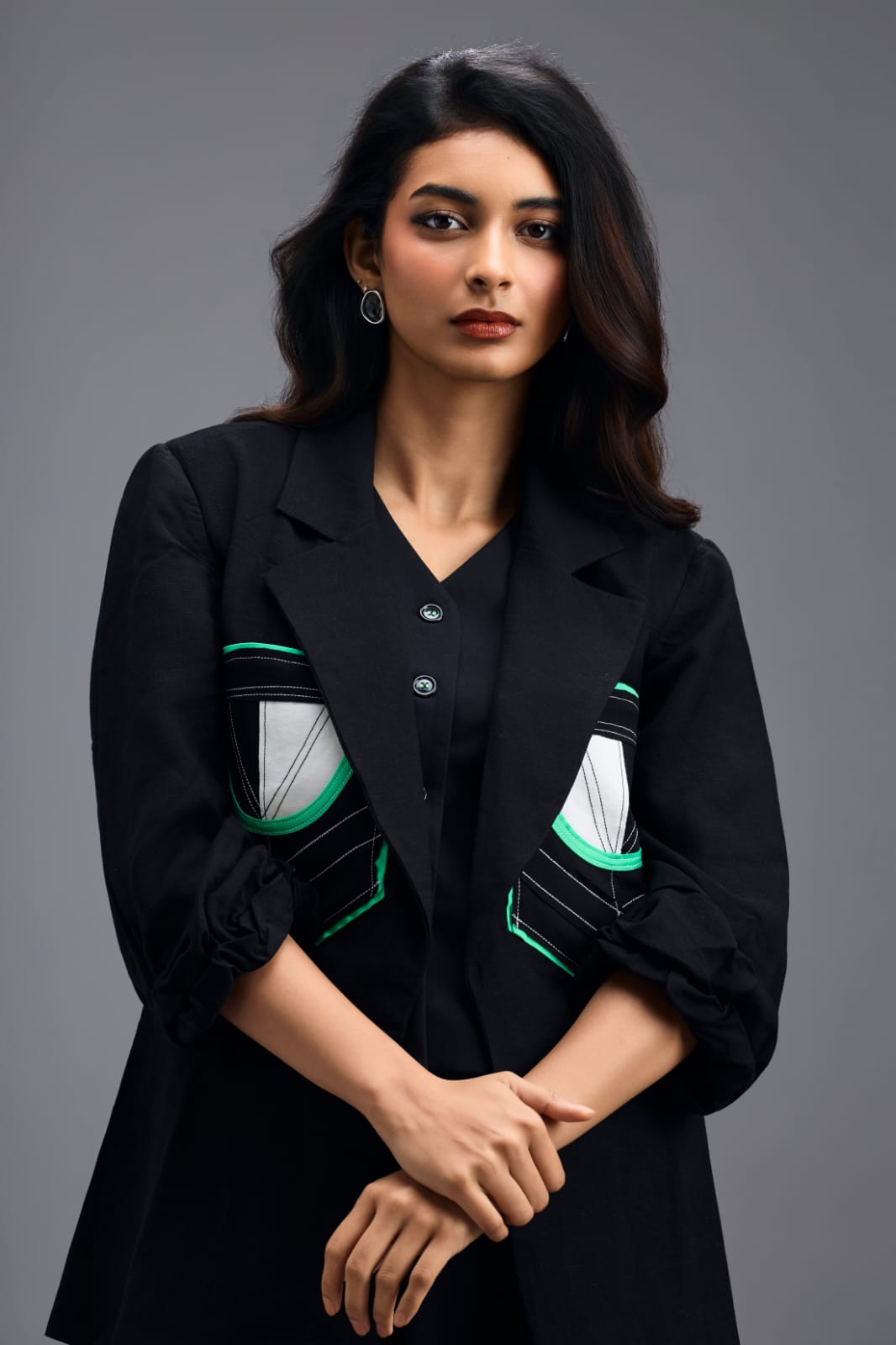 BLACK TAILORED BLAZER WITH GEOMETRIC PATCH POCKET DETAIL AND NEON PIPING