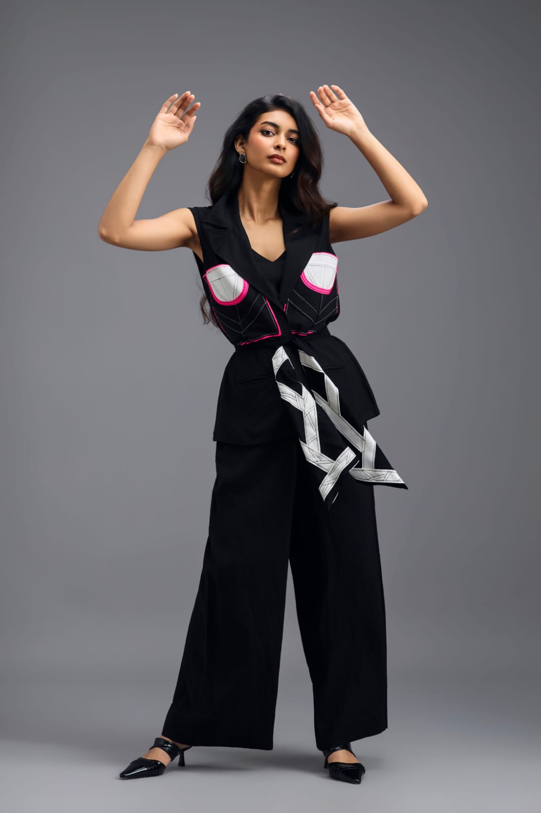 BLACK CO-ORD SET WITH NEON GEOMETRIC PANELLED SLEEVELESS BLAZER, TWISTED TOP AND TROUSERS