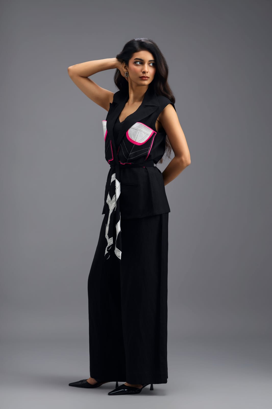 BLACK CO-ORD SET WITH NEON GEOMETRIC PANELLED SLEEVELESS BLAZER, TWISTED TOP AND TROUSERS