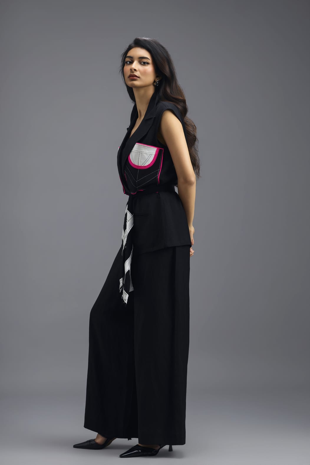 BLACK CO-ORD SET WITH NEON GEOMETRIC PANELLED SLEEVELESS BLAZER, TWISTED TOP AND TROUSERS