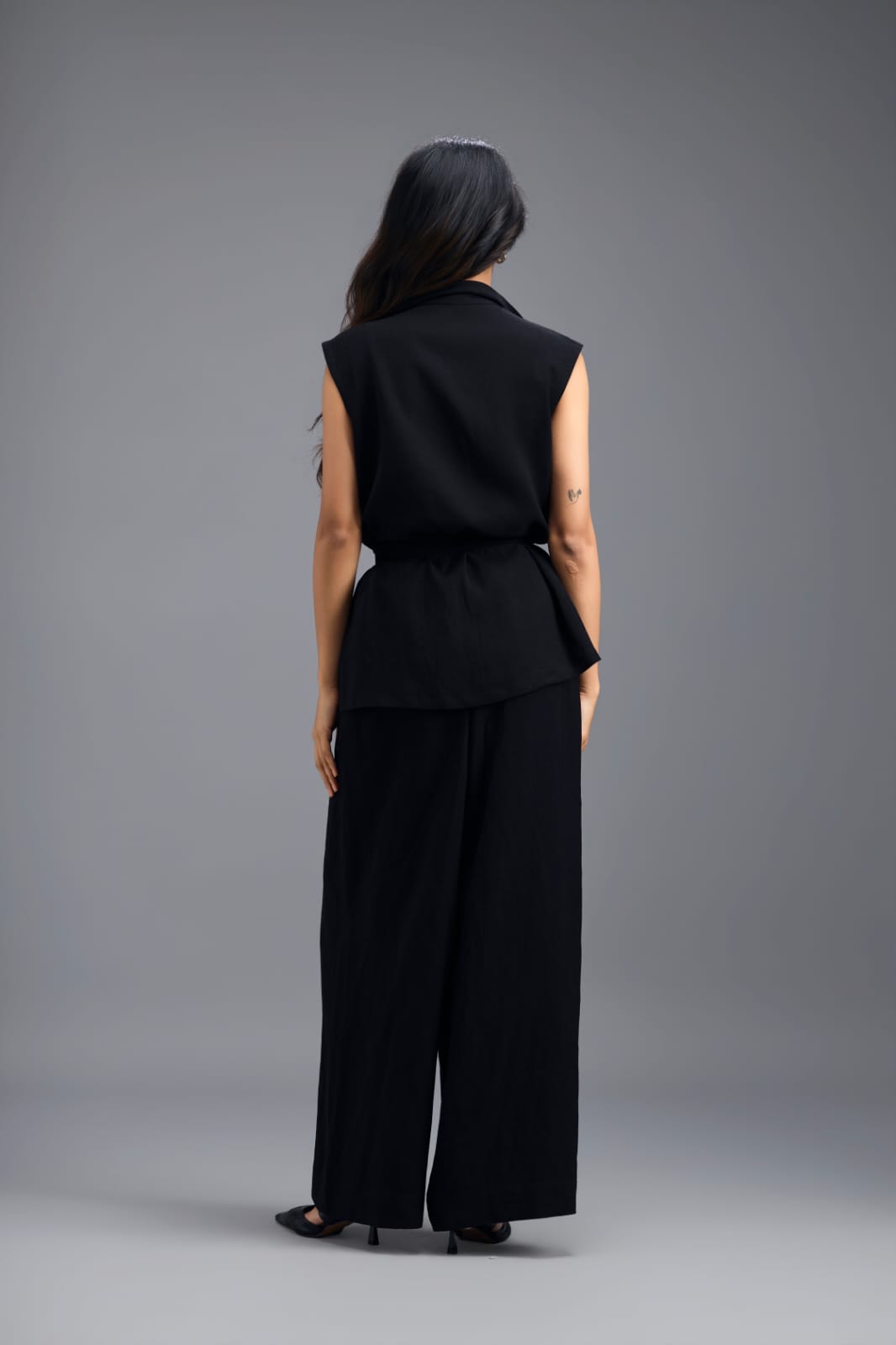 BLACK CO-ORD SET WITH NEON GEOMETRIC PANELLED SLEEVELESS BLAZER, TWISTED TOP AND TROUSERS